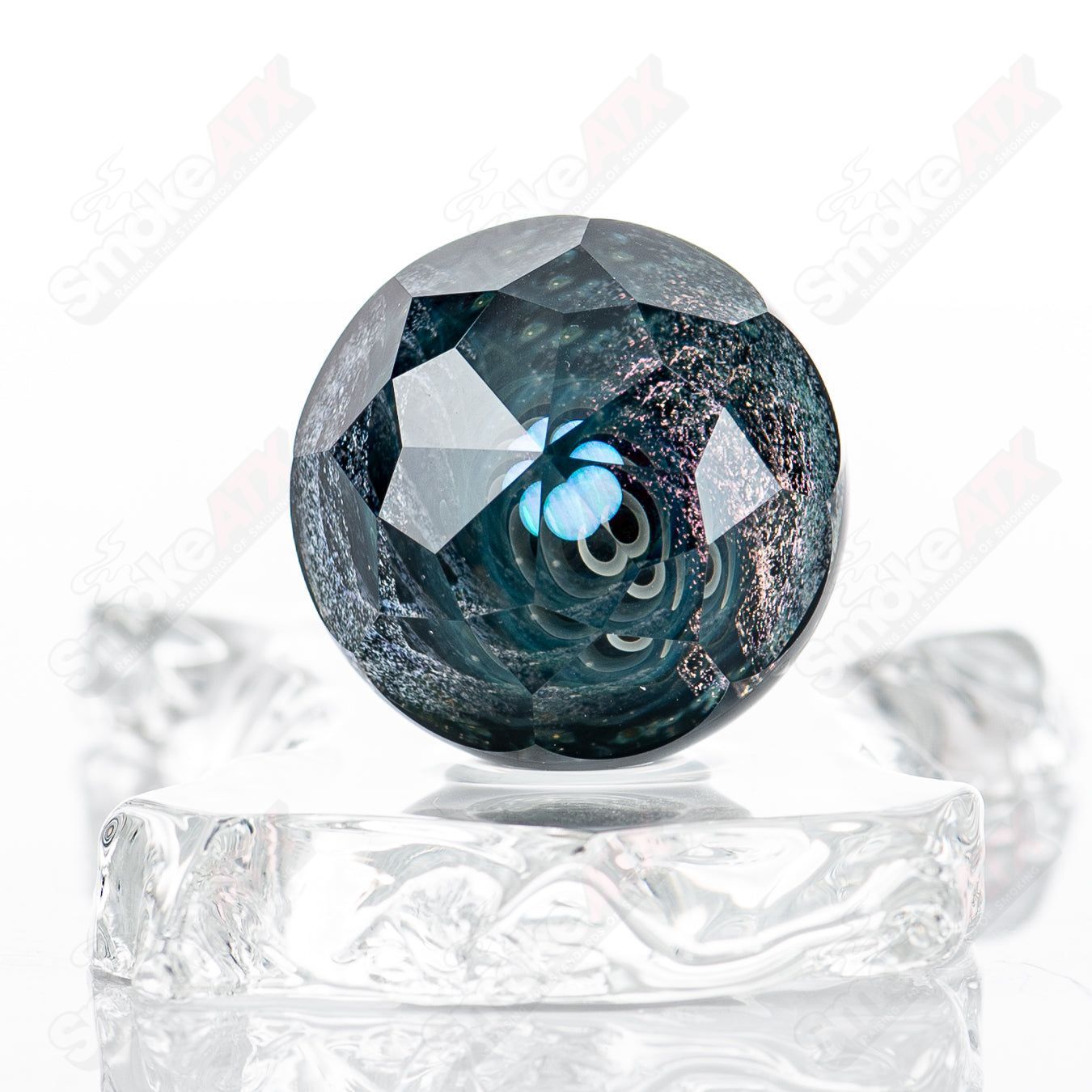 Large Space Slurper marble by Fatal Facets, featuring intricate glass artwork from the Eric Mort x Fatal Facets collaboration.