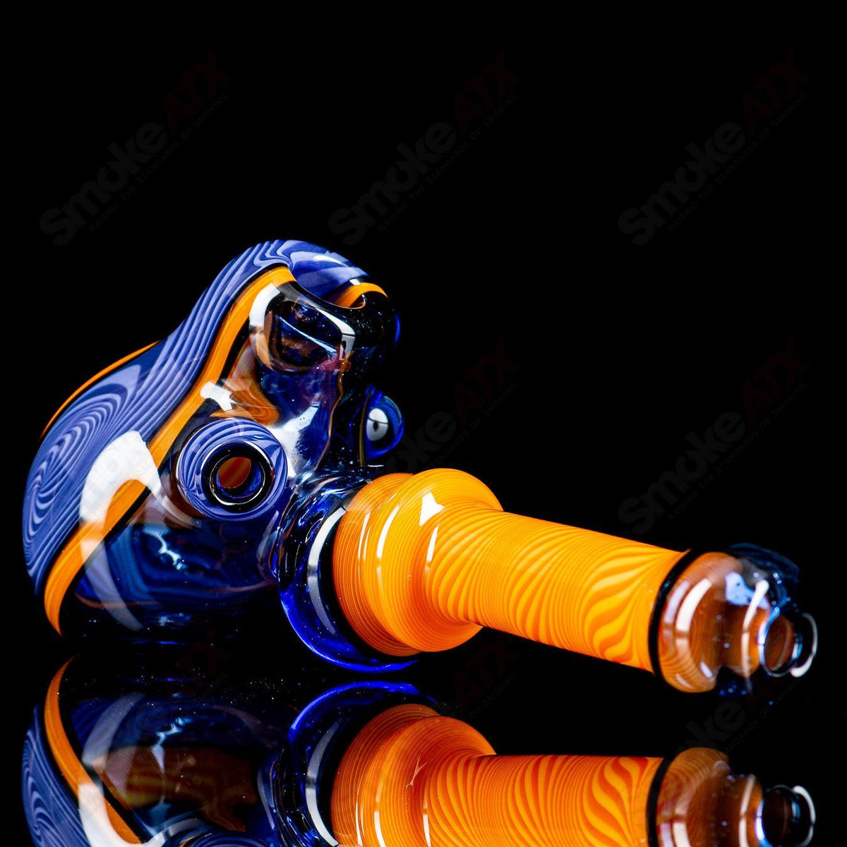 Chaz Pyle lined montage hammer glass pipe with detailed design, crafted for smooth handling and aesthetic appeal.
