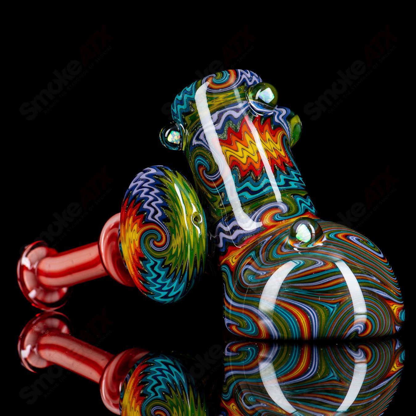 Hand pipe from Art of Hustle's Linework Wig Wag Hammer collection, featuring detailed glass art and vibrant linework design.
