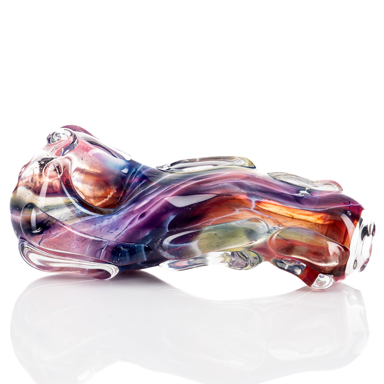 Clear glass donut-shaped hand pipe by Nobody Glass, featuring a smooth, rounded design for easy grip and use.