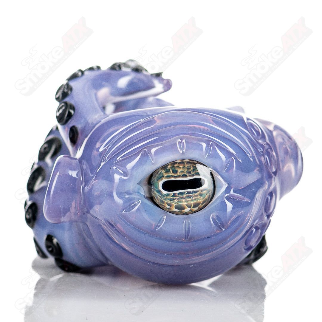 Mako Glass Seamonster Spoon hand pipe with colorful glass design and detailed sea creature motif.