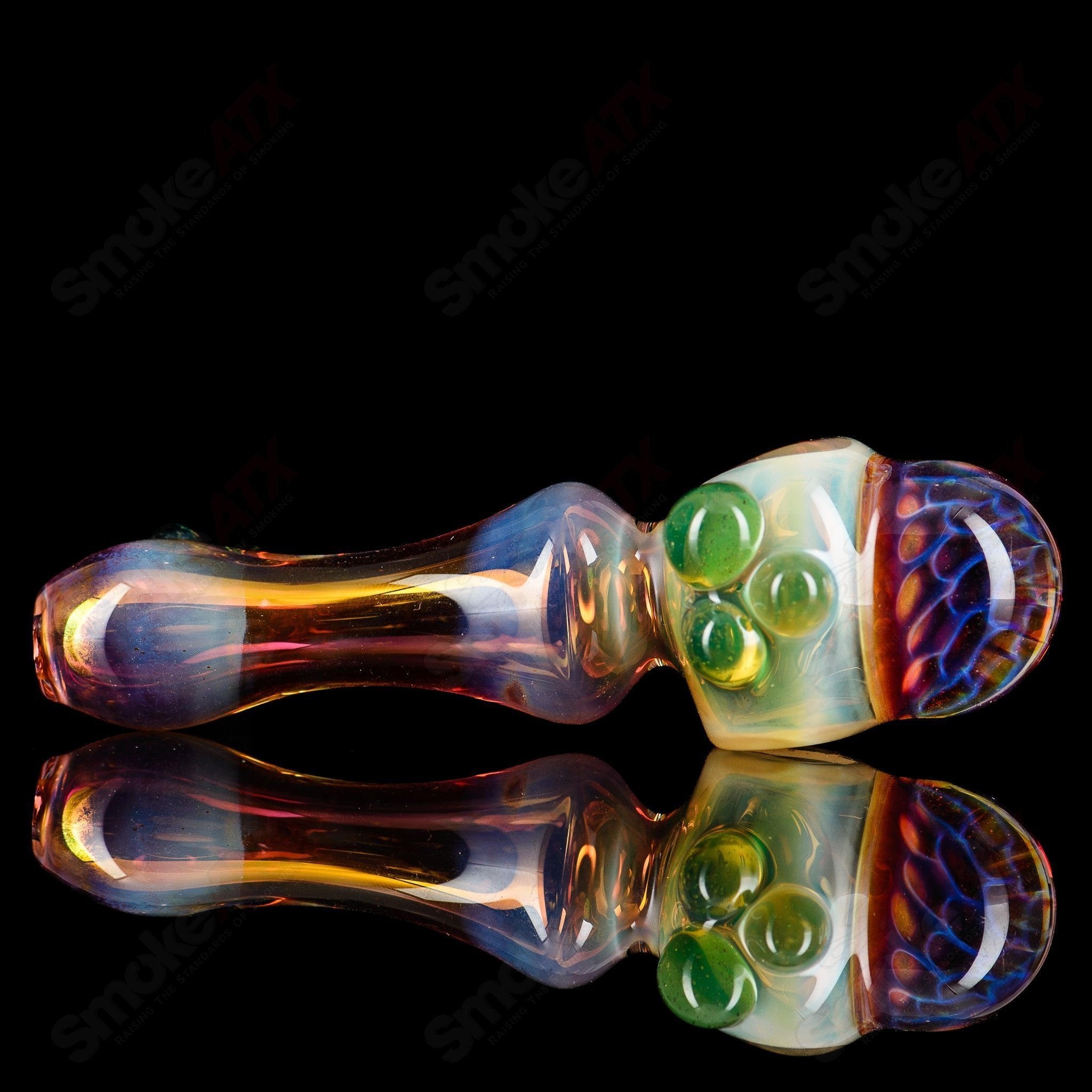 Fumed Spoon Honeycomb Diligent Glass pipe showing a clear glass pipe with honeycomb design and fumed accents by Diligent Glass