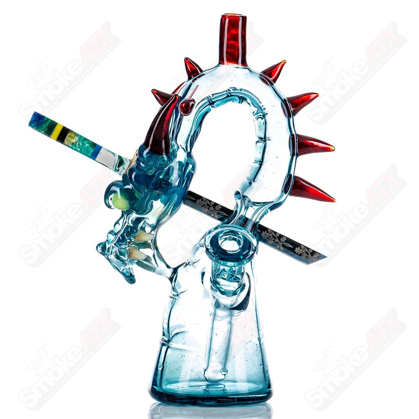 Marina Mini Dragon Rig by Tony Kazy, a colorful heady glass concentrate rig with intricate dragon design and compact size.
