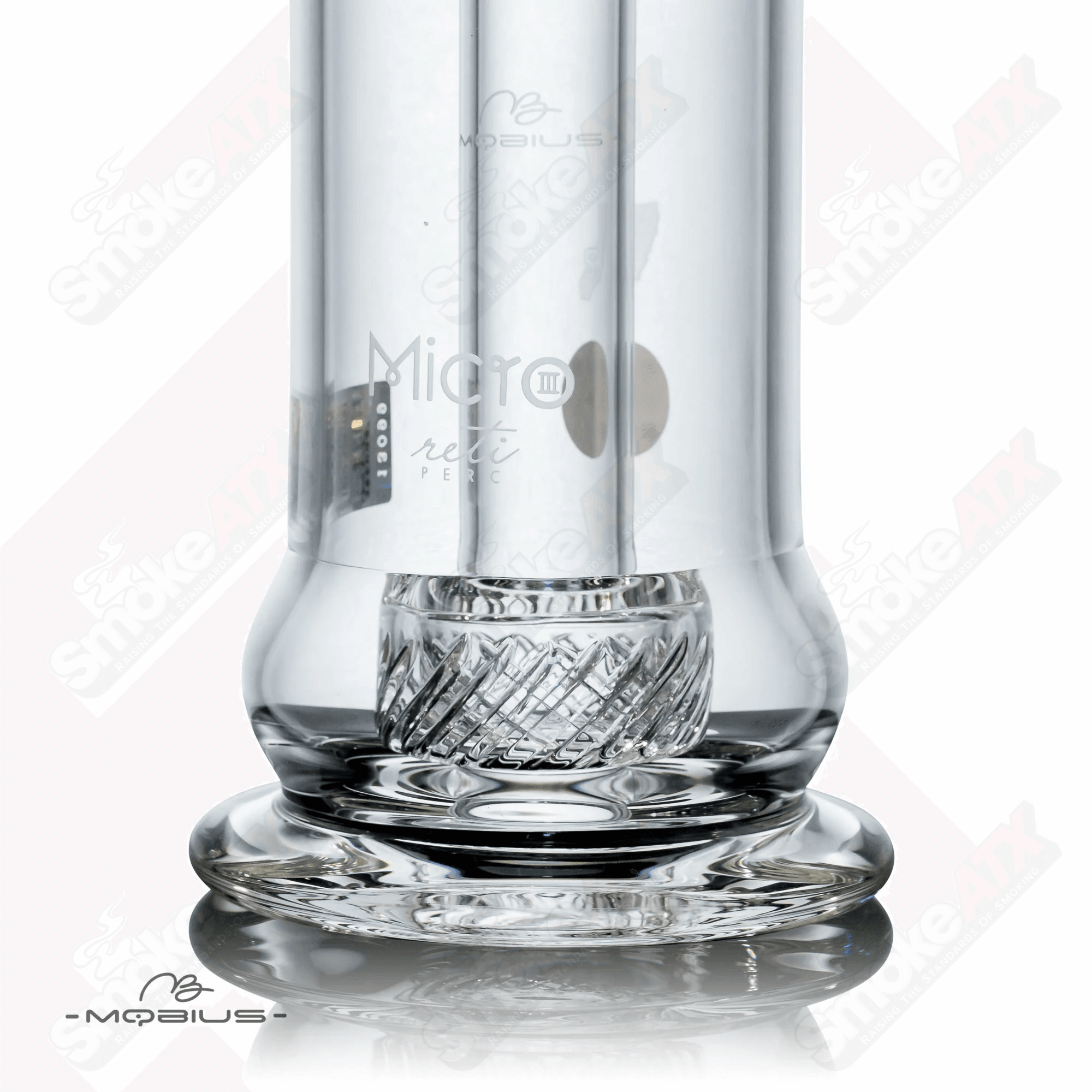 Mobius Micro Reti V3 glass bubbler with intricate design and clear glass construction for smooth smoking experience.