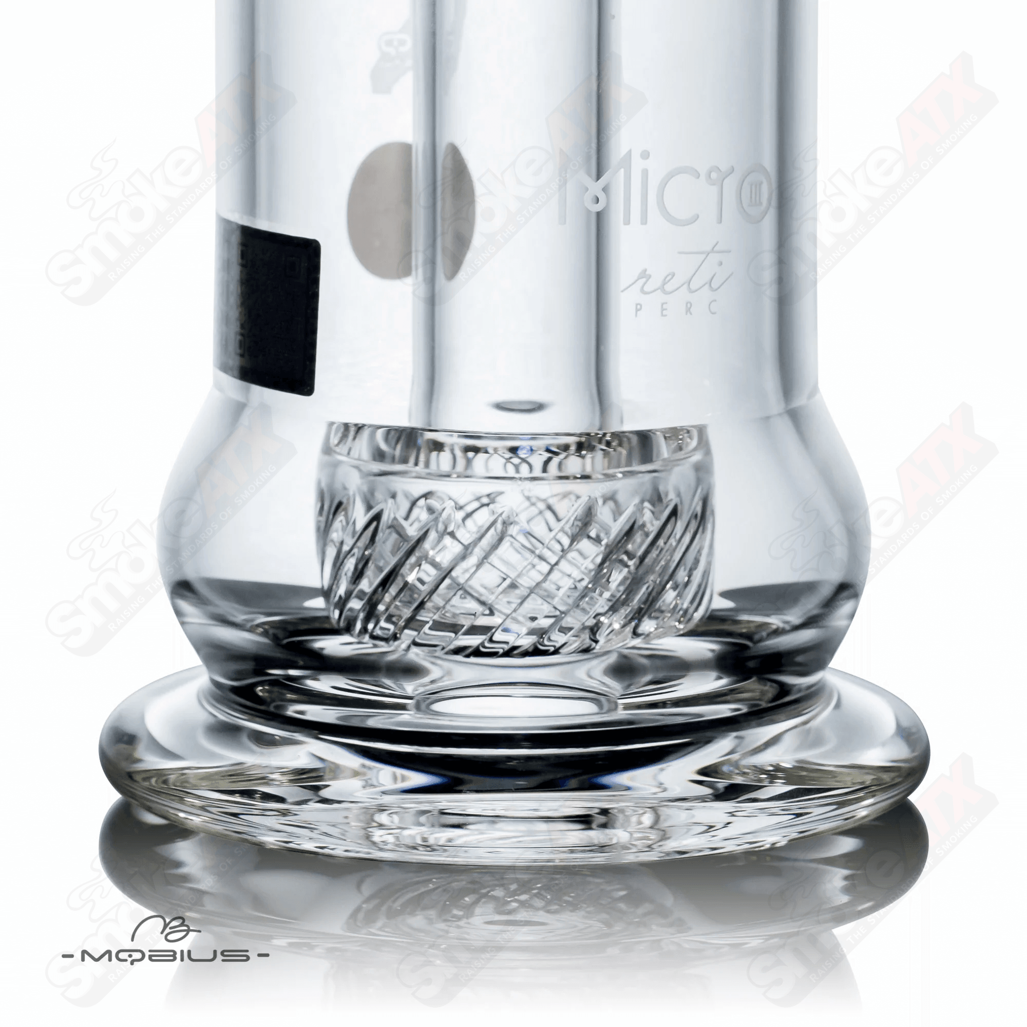 Mobius Micro Reti V3 glass bubbler with intricate design and clear glass body for smooth smoking experience.