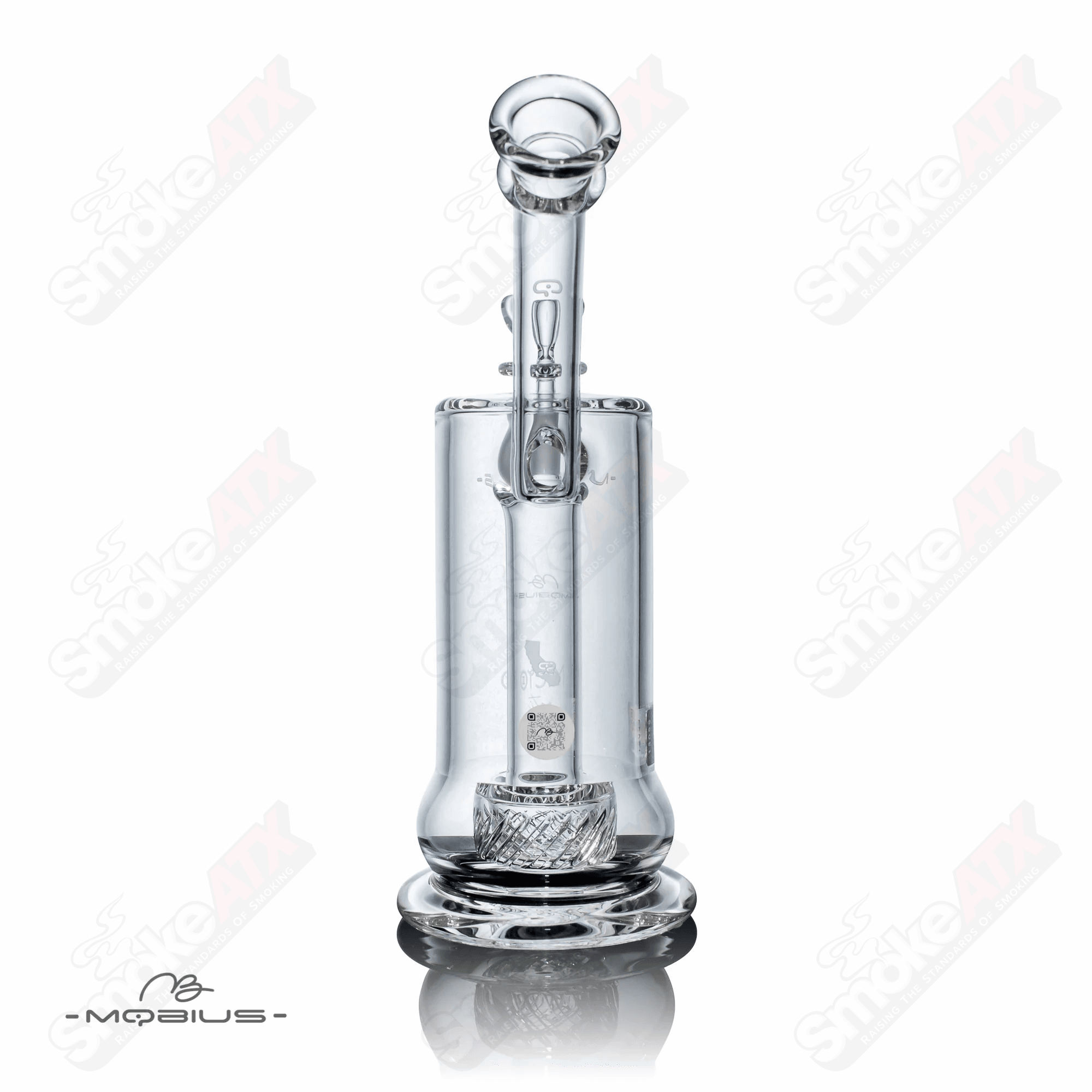 Glass bubbler called Micro Reti V3 Mobius with clear glass body and intricate design details.
