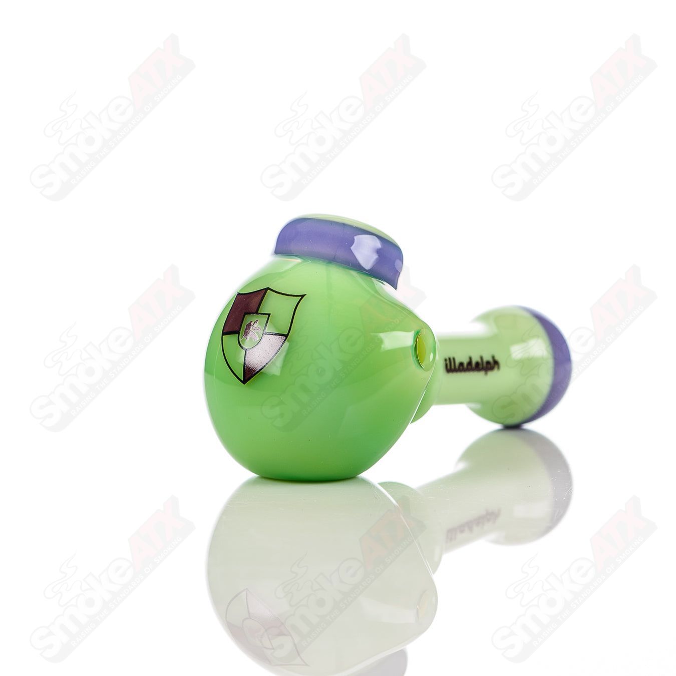 Illadelph glass multi-hole spoon pipe in milky green and purple with multiple holes for smooth hits.