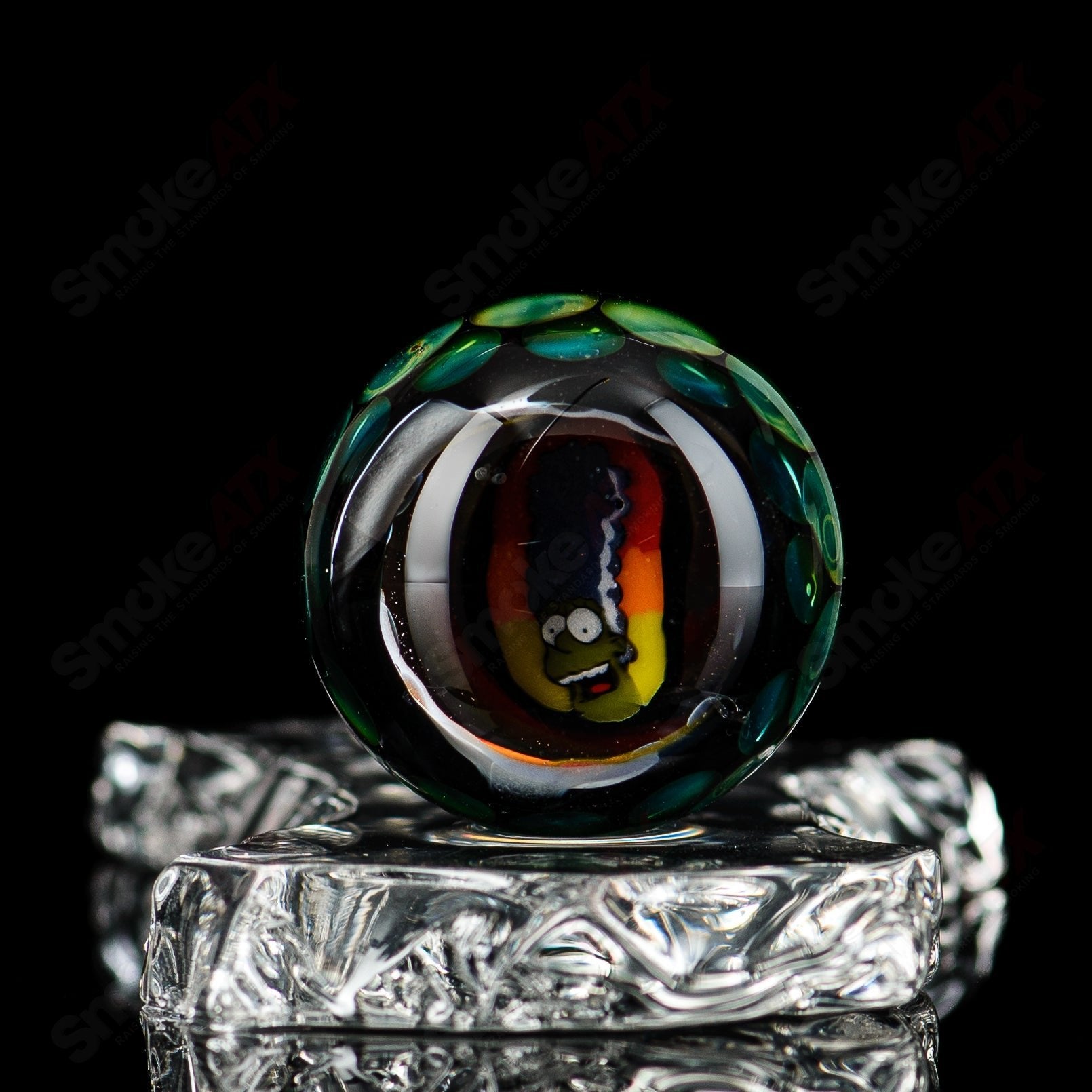 Close-up of #3 Marble Flex Glass marbles showing smooth, colorful glass spheres with marbled patterns in a clear container.