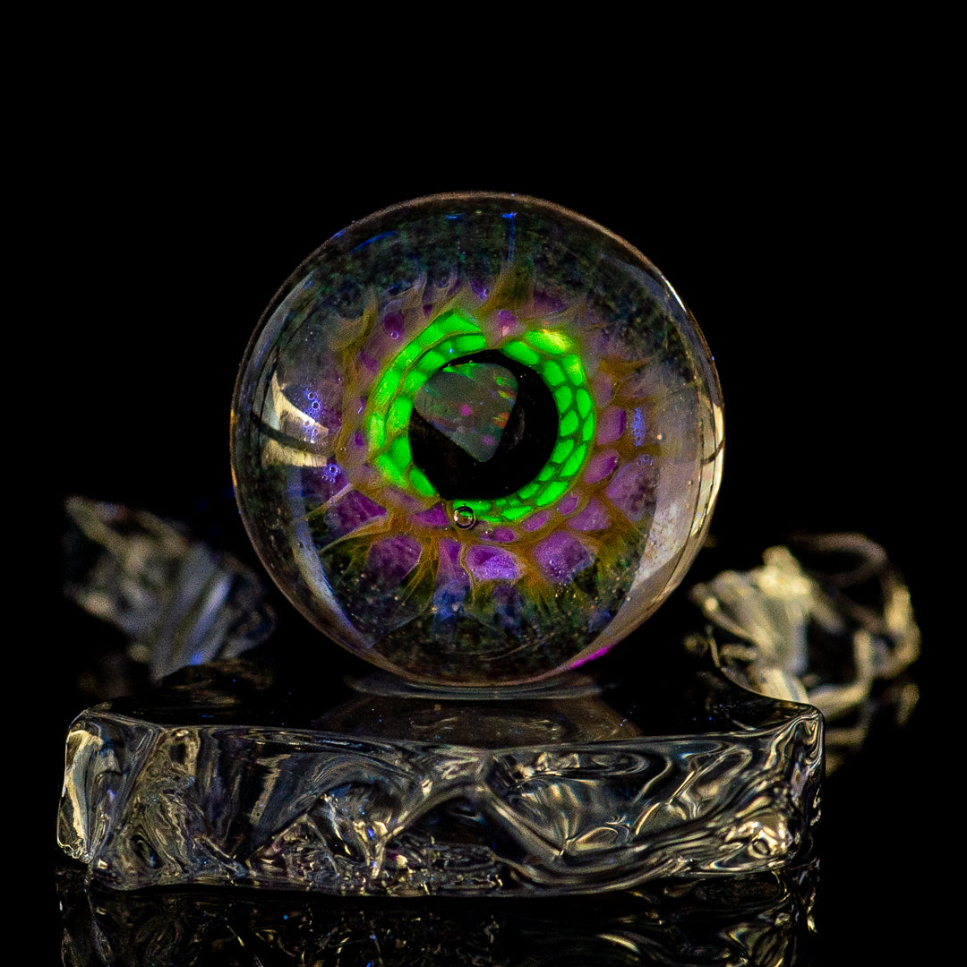 Dichropal Eye Mib Indo Glass heady glass with colorful marbles and intricate design, showcasing craftsmanship and vibrant details.
