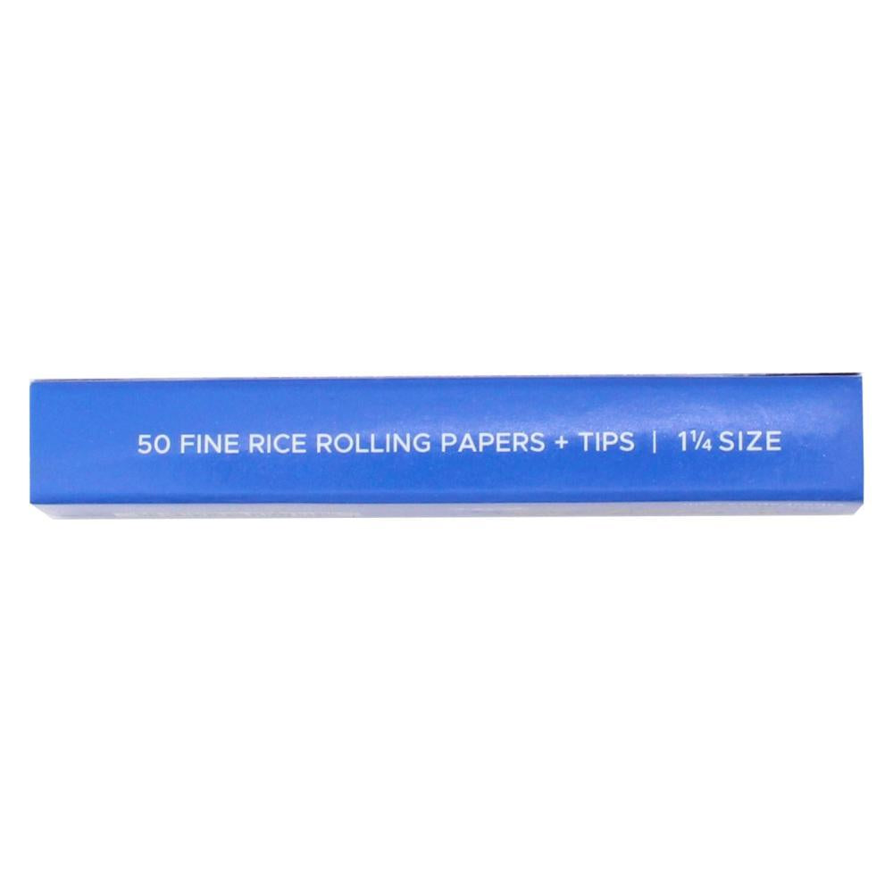 Vibes 1 1/4 rice rolling papers with tips for rolling cigarettes or joints, lightweight and natural in appearance.