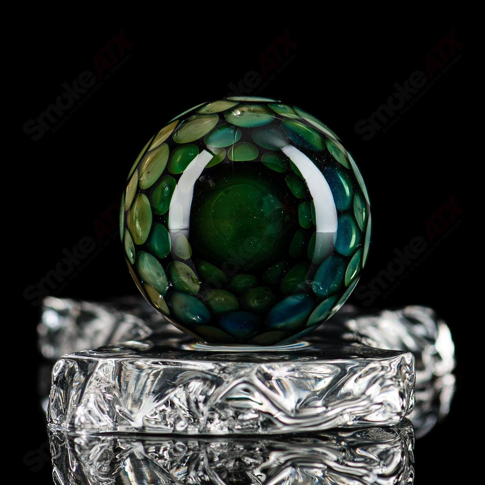 Flex Glass #2 Marble Flex Glass marbles with colorful, swirled marble designs in a clear glass container.