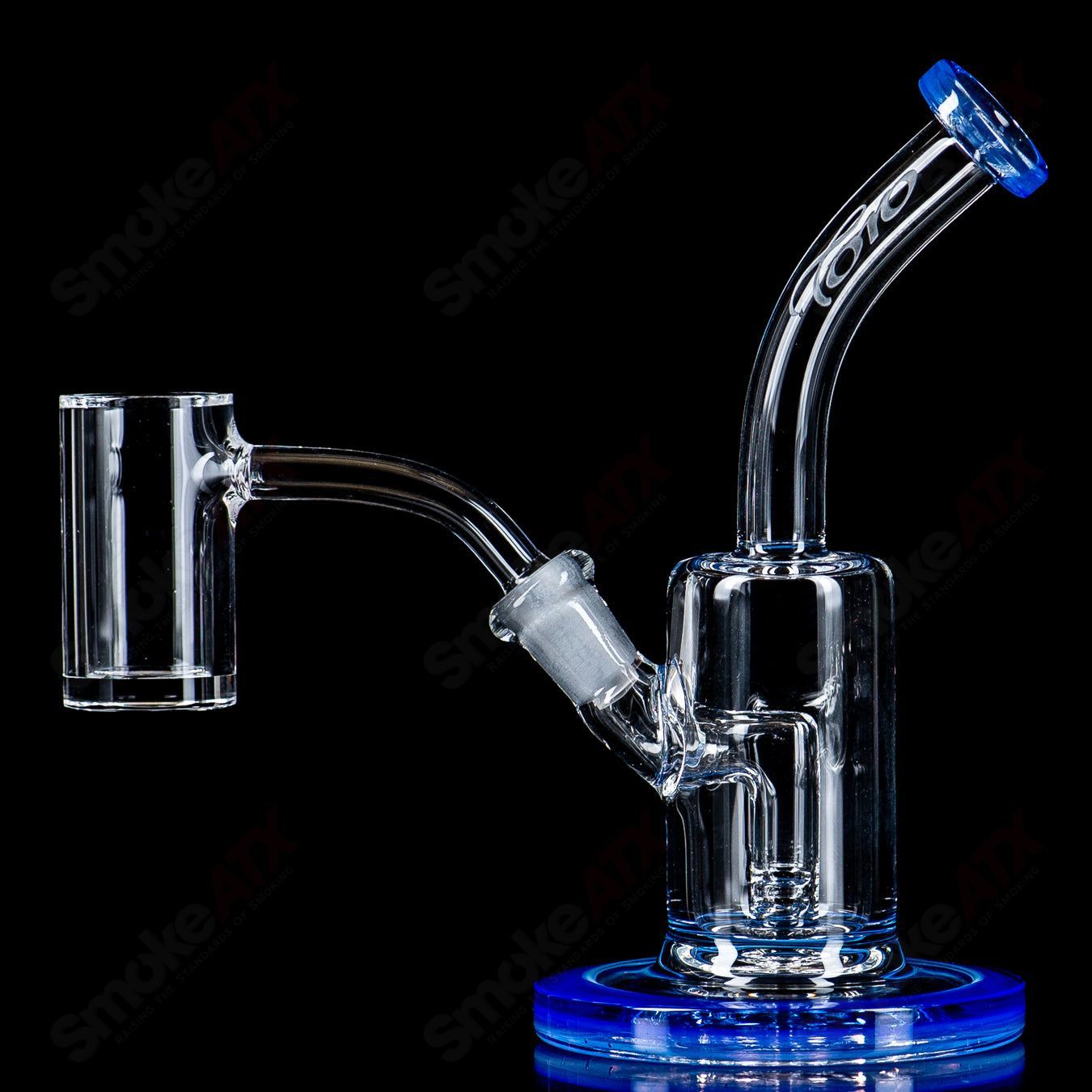 Toro Nano Color Piece with Nano Grail, a stylish heady glass concentrate rig featuring vibrant colors and intricate glasswork.