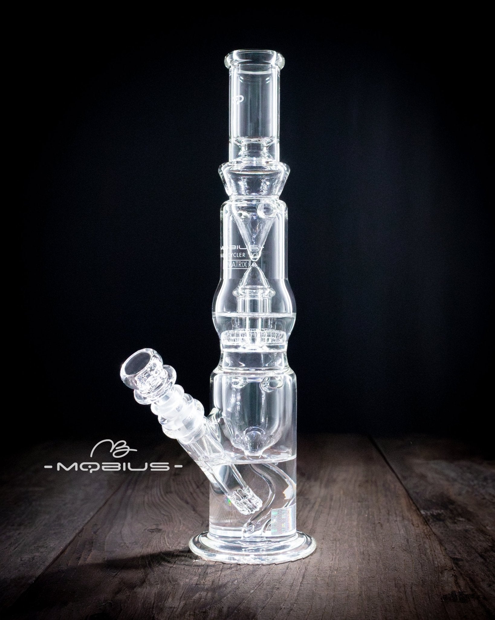 Mobius Nanocycler V3 Matrix Perc glass waterpipe with intricate percolator design, clear glass construction.