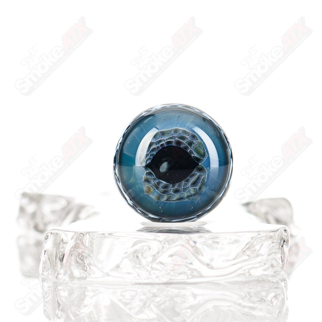 24mm black Magic UV Dotstack Eye Mib Indo Glass heady glass marble with vibrant UV-reactive dots on clear glass background.