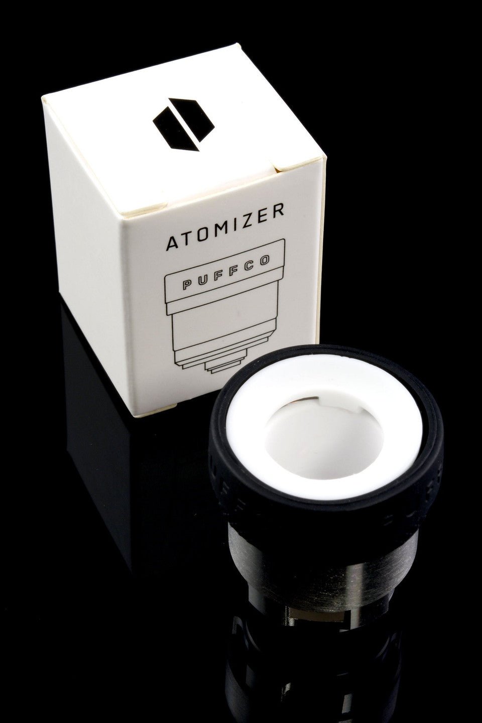 Puffco OG Puffco Peak atomizer attached to vaporizer, focus on the sleek design and metal components.