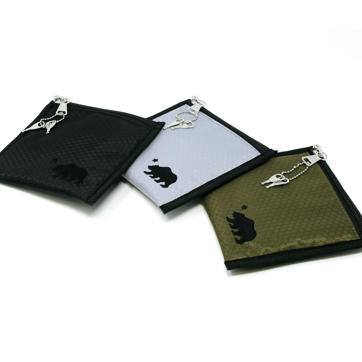 Olive green Cali Crusher 6x6 pouch with black accent, shown open with contents, lifestyle bag for storage and organization.