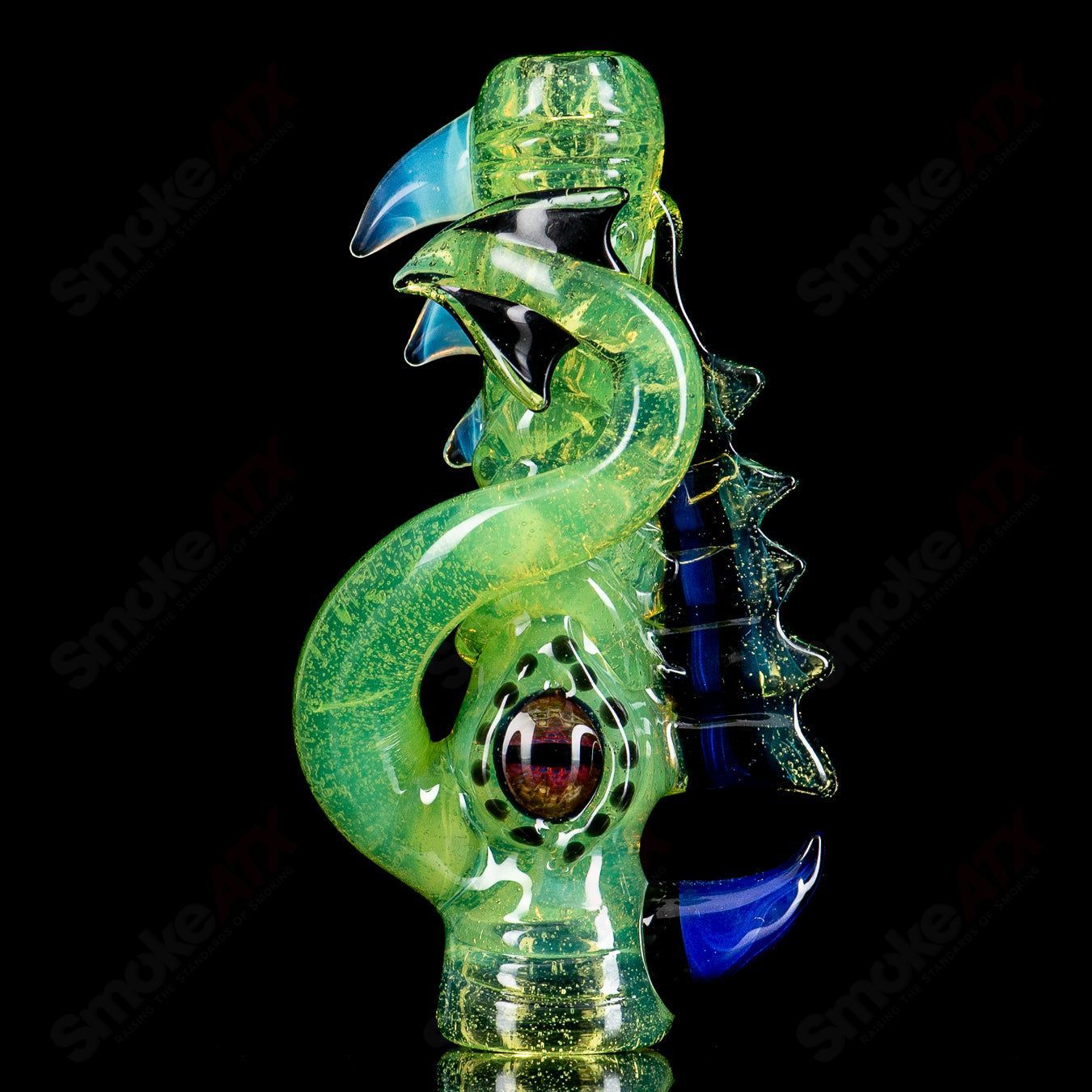 Colorful Mako Glass full-color chillum, a compact heady glass pipe with vibrant design and clear glass accents.