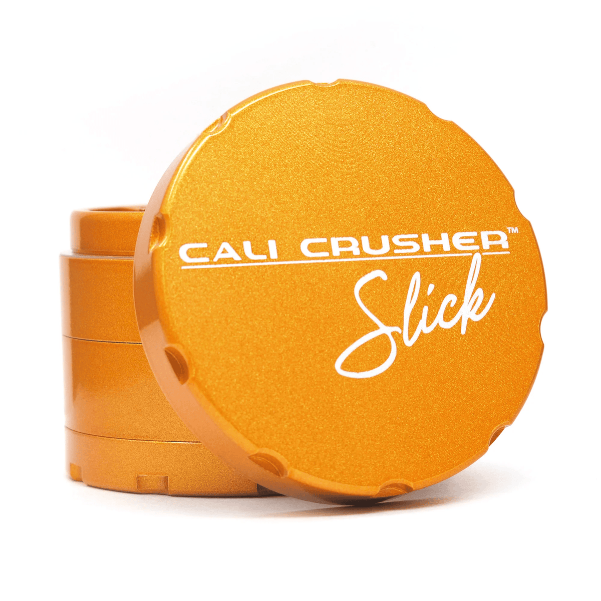 Orange 2.5-inch Cali Crusher 4-piece metal grinder for herbs and spices, featuring a sleek slick design and durable construction.