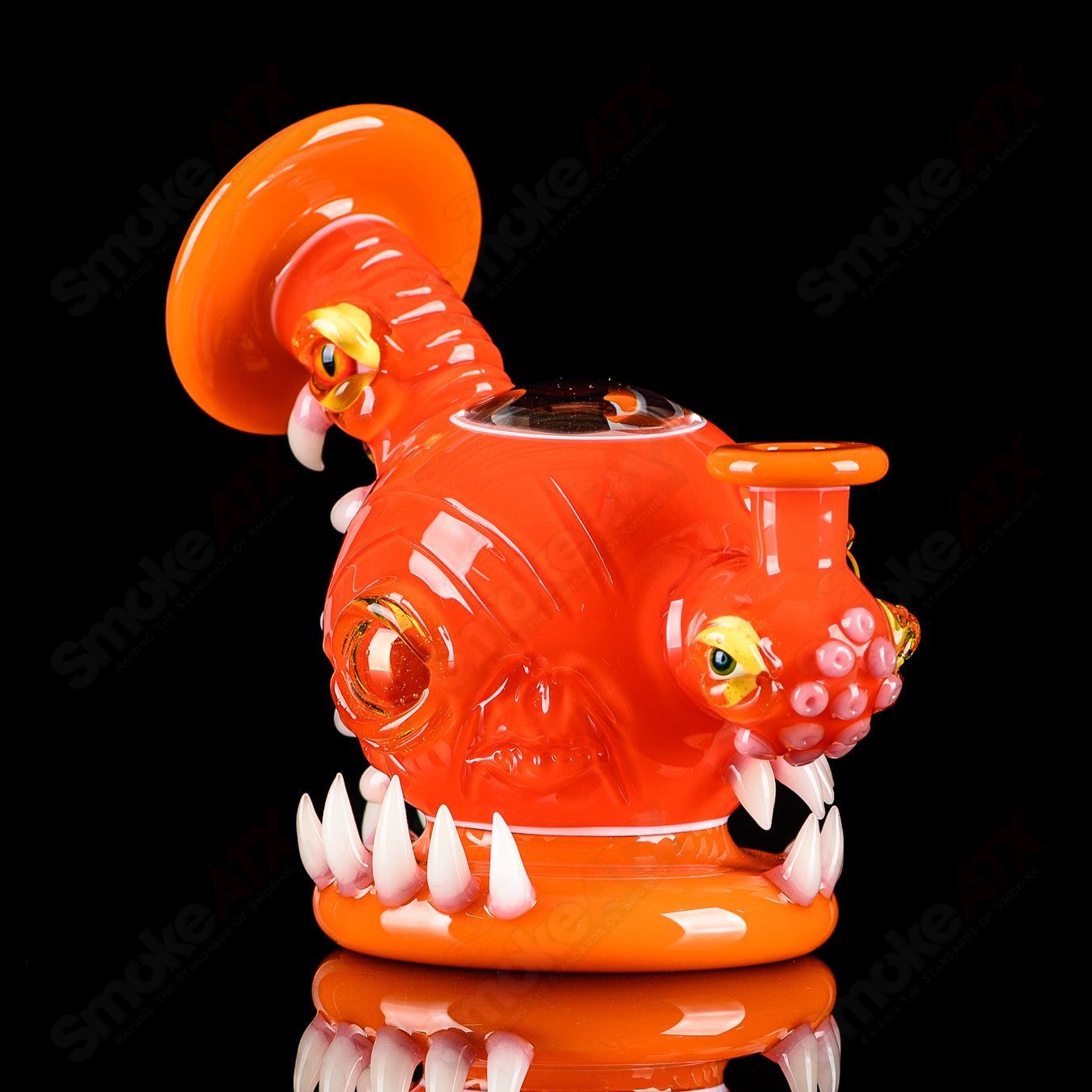 Orange Crayon Orb Rig by Salt & JAG, a colorful glass concentrate rig with a spherical orb design from Salt Glass.