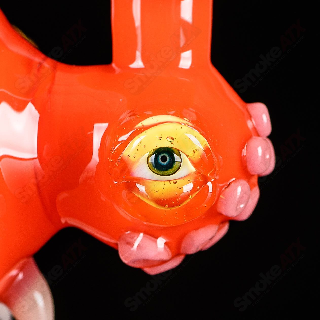 Orange Crayon Orb Rig by SALT & JAG, a colorful heady glass concentrate rig with a playful crayon-inspired design.
