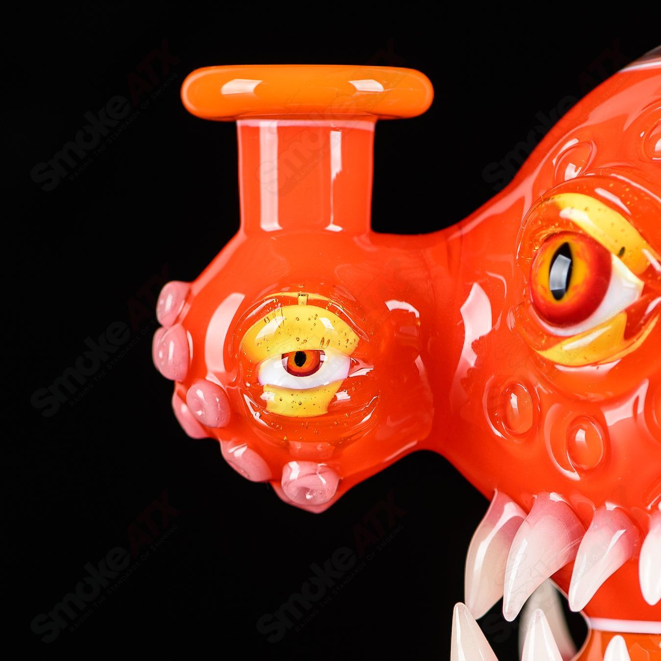 Orange Crayon Orb Rig by SALT & JAG, a glass concentrate rig featuring vibrant orange glass with orb accents.