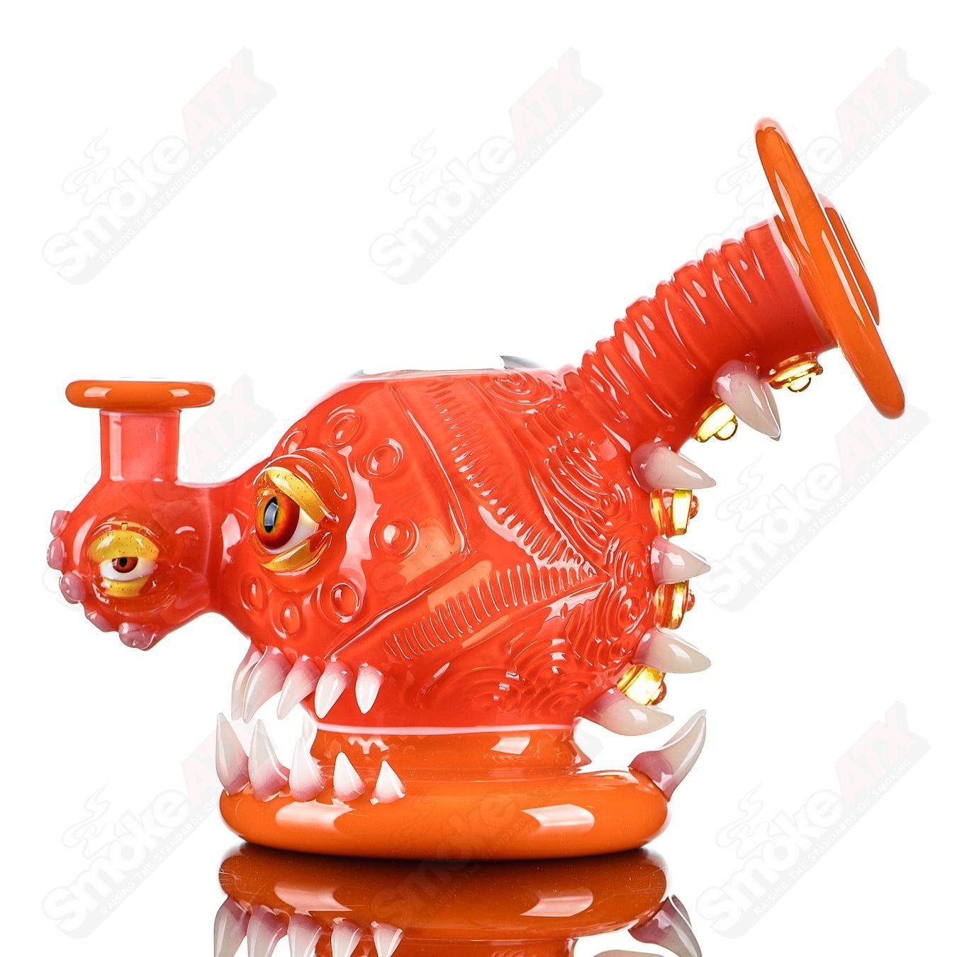 Orange Crayon Orb Rig by SALT & JAG, a colorful heady glass concentrate rig with vibrant orange and intricate glass design.