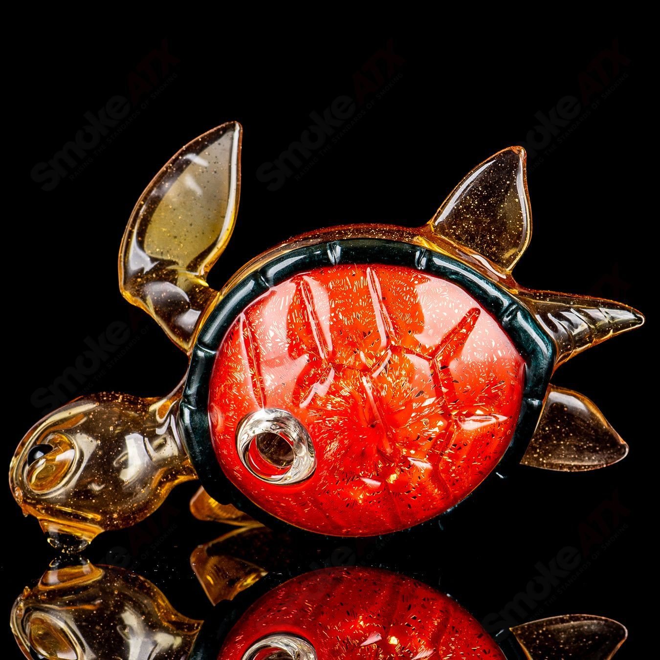 Orange dichro Honu sea turtle rig by Turtle Time, a colorful heady glass concentrate rig featuring a sea turtle design.