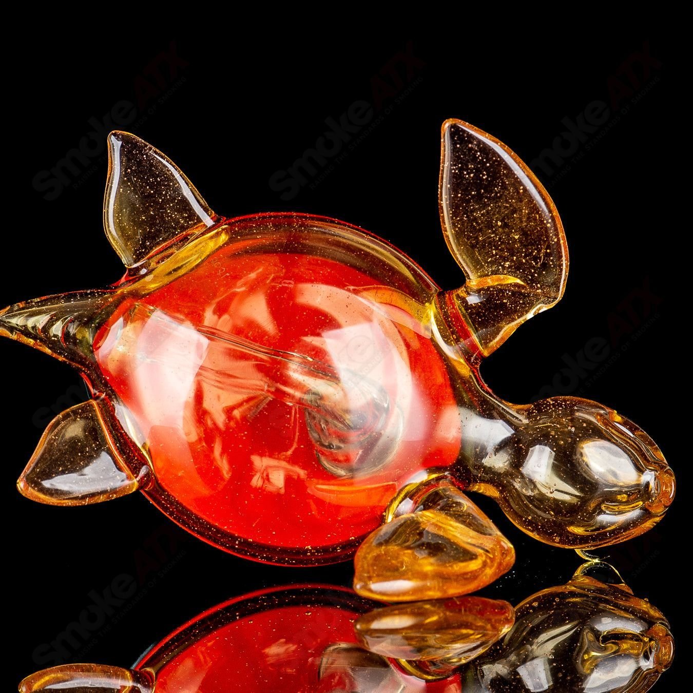 Orange dichro Honu sea turtle rig by Turtle Time, a glass concentrate rig featuring vibrant orange hues and sea turtle design.