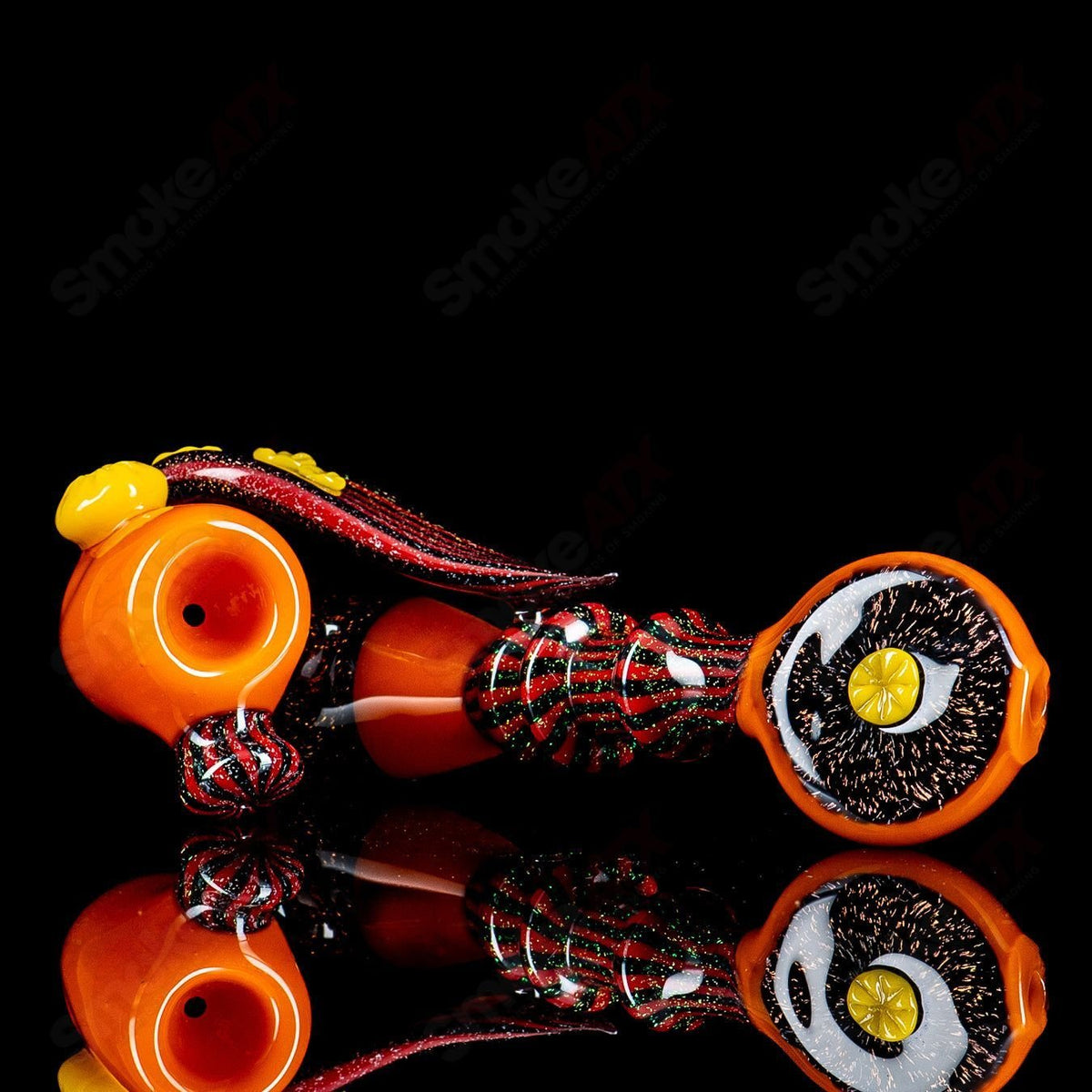 Orange Dichro Sherlock glass pipe by Dellene Peralta, featuring vibrant color-shifting glass and a classic Sherlock shape.