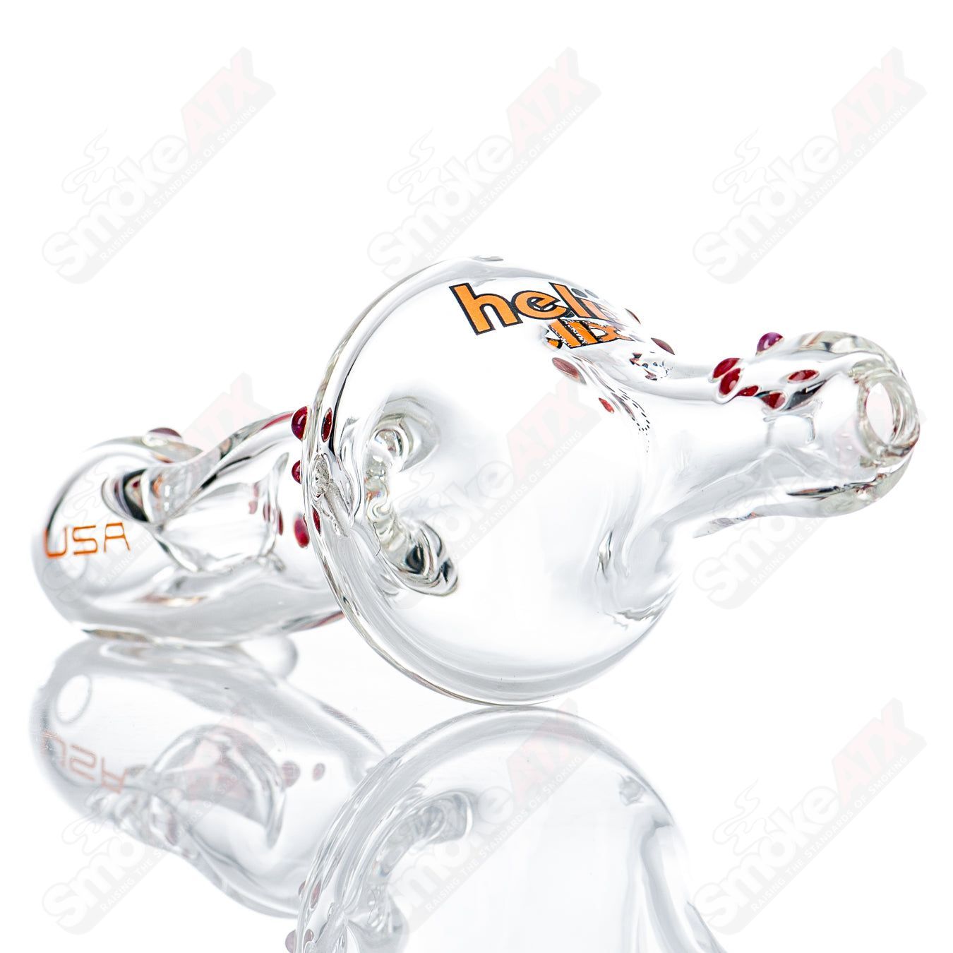 Orange Label Micro Classic Hybrid Steam Roller glass pipe by American Helix, featuring a compact design and intricate glasswork.
