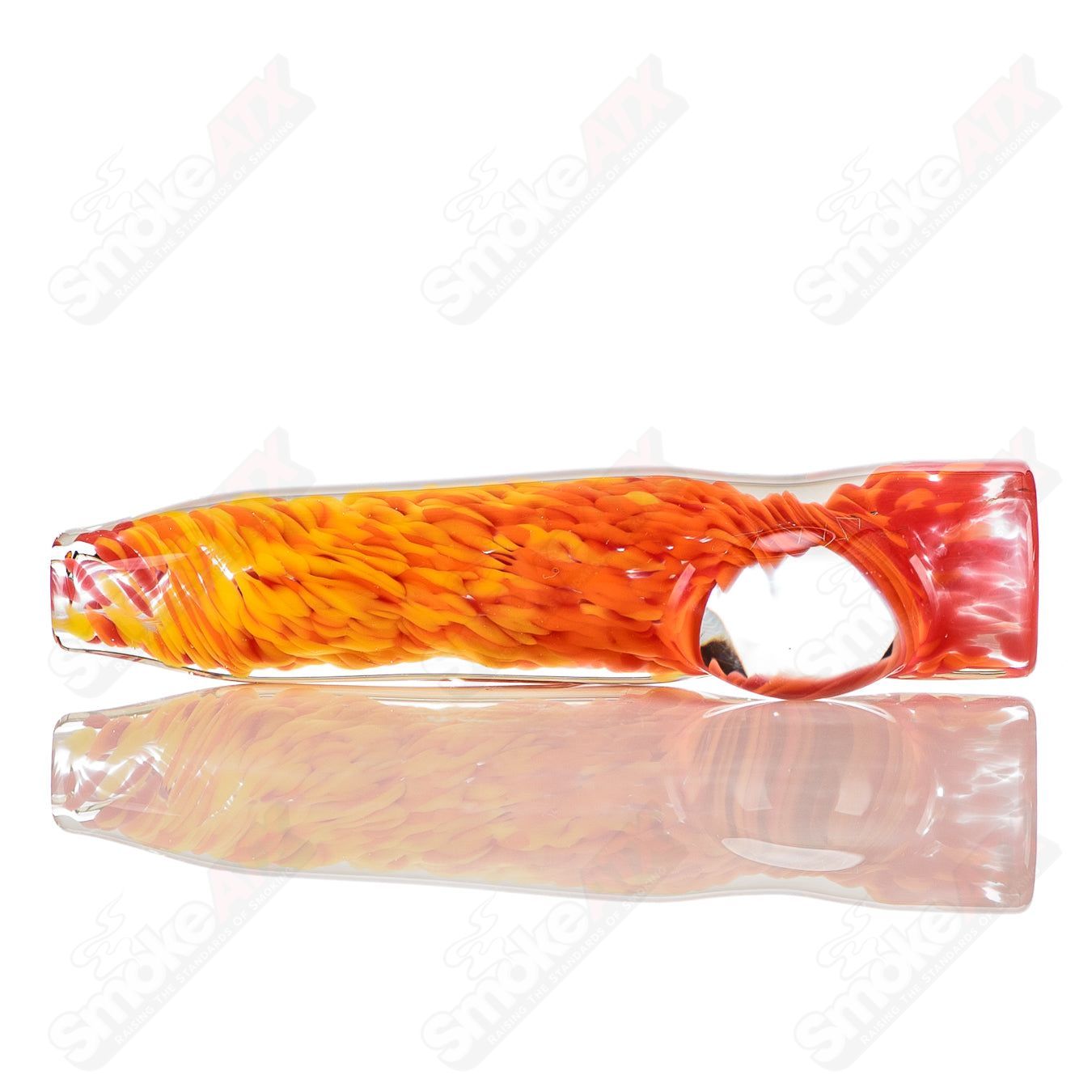 Orange and yellow frit glass chillum with clear dot signature by JMK Glass, showcasing vibrant colors and intricate design.
