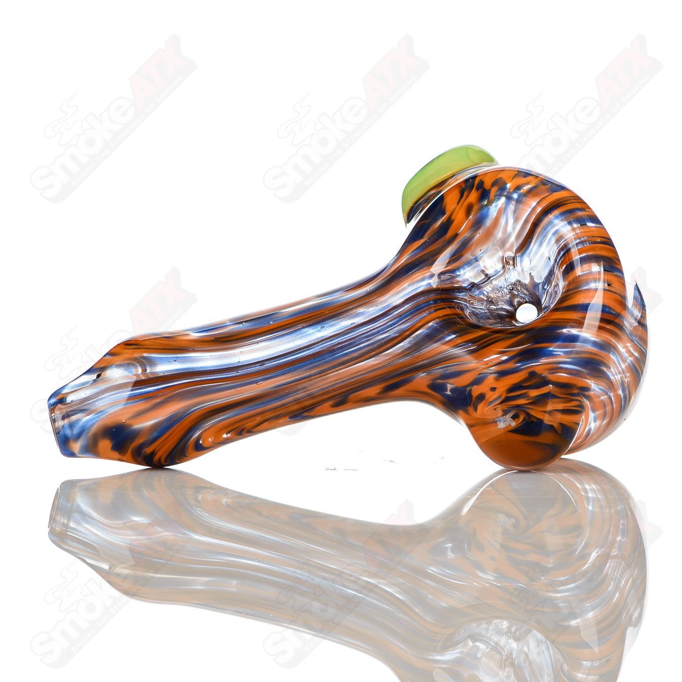 Handmade glass spoon pipe by JMK Glass featuring orange and purple worked design with slyme accent and carb, signed by the artist.