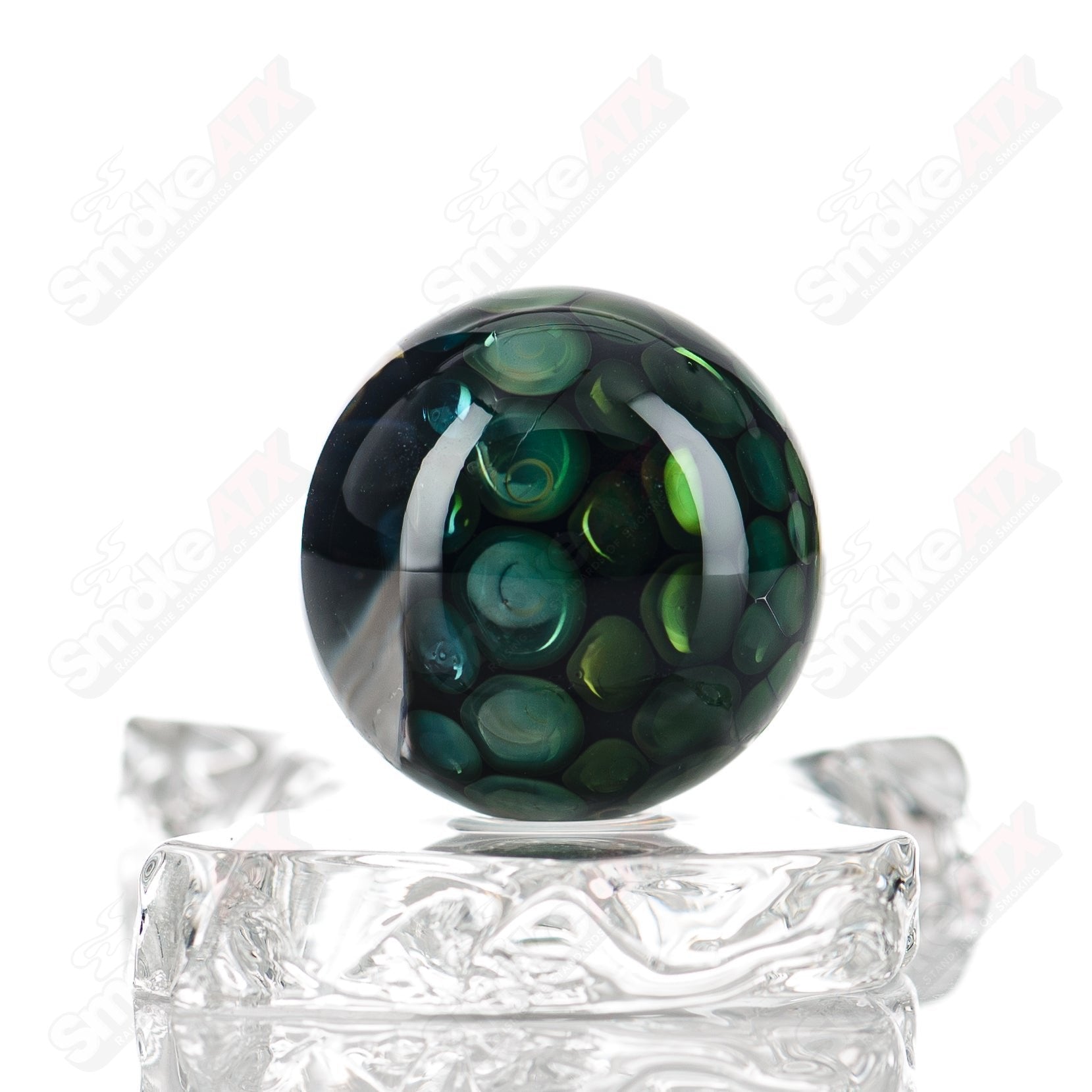 Flex Glass #3 Marble Flex Glass marbles in various colors with smooth, rounded glass surfaces and intricate marble patterns.