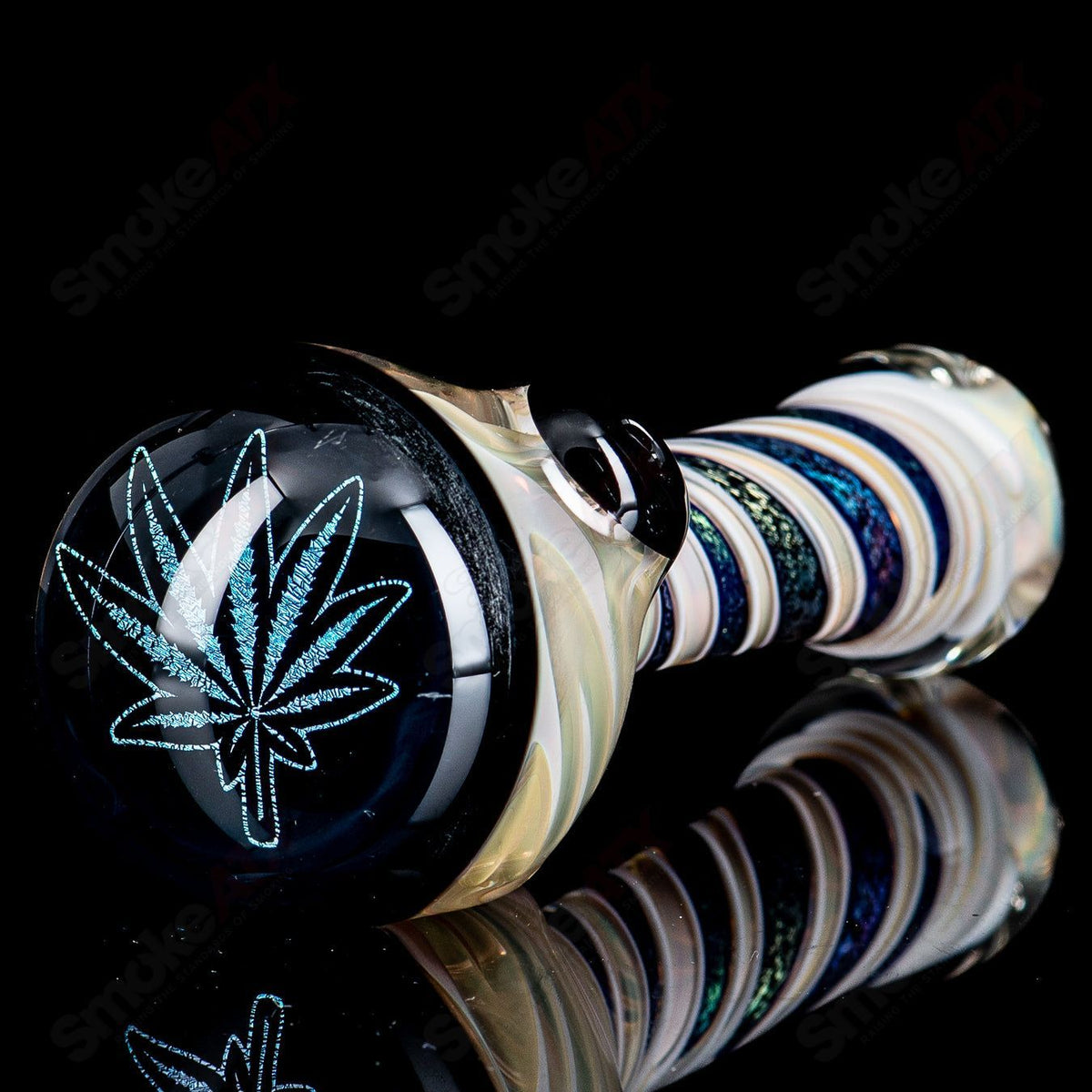Glass pot leaf dichro image spoon pipe by Talent Glass Works featuring colorful, detailed leaf design on a handheld glass pipe.