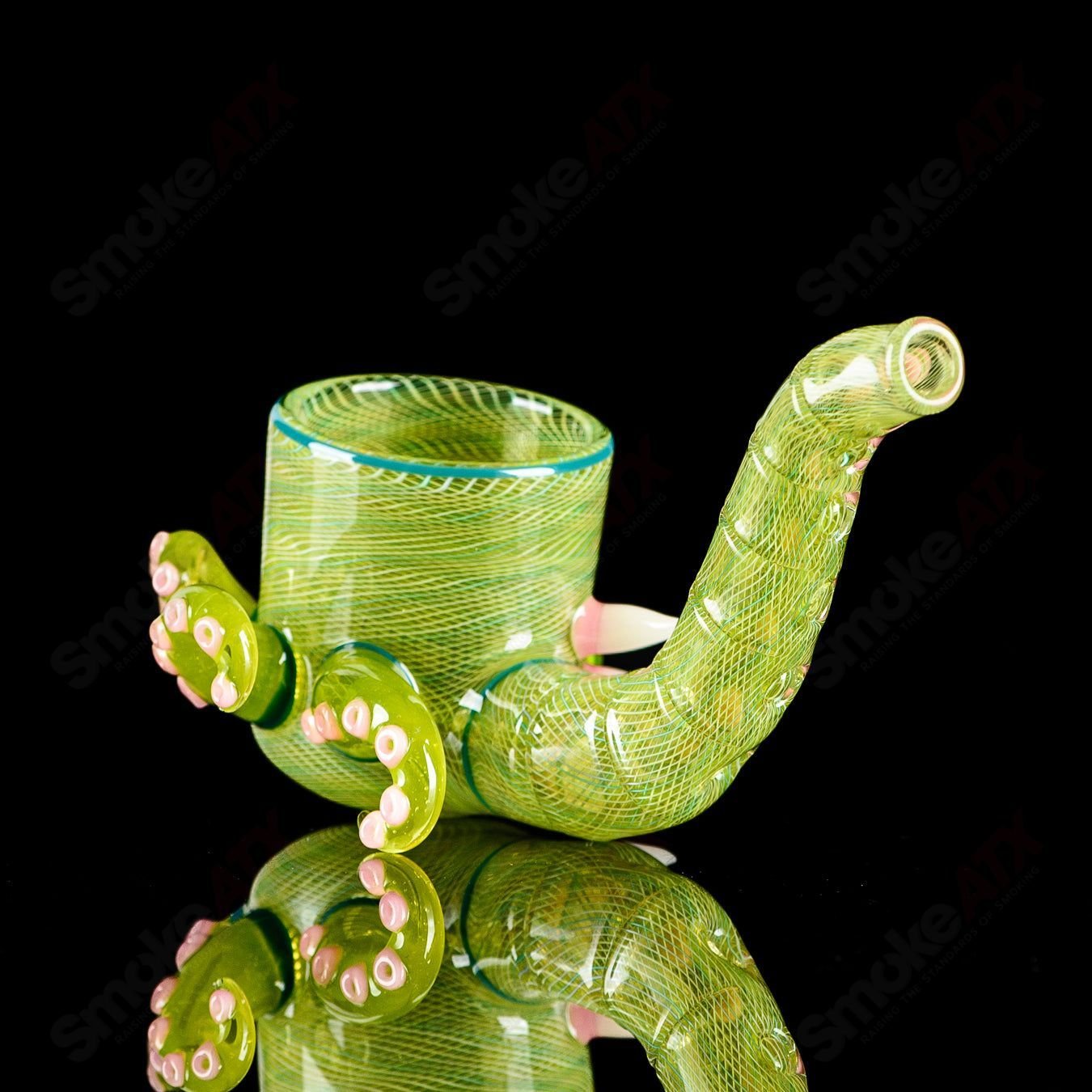 Proxy Sherlock by Dosa & SALT Glass, a clear heady glass pipe with intricate design and mouthpiece detail.