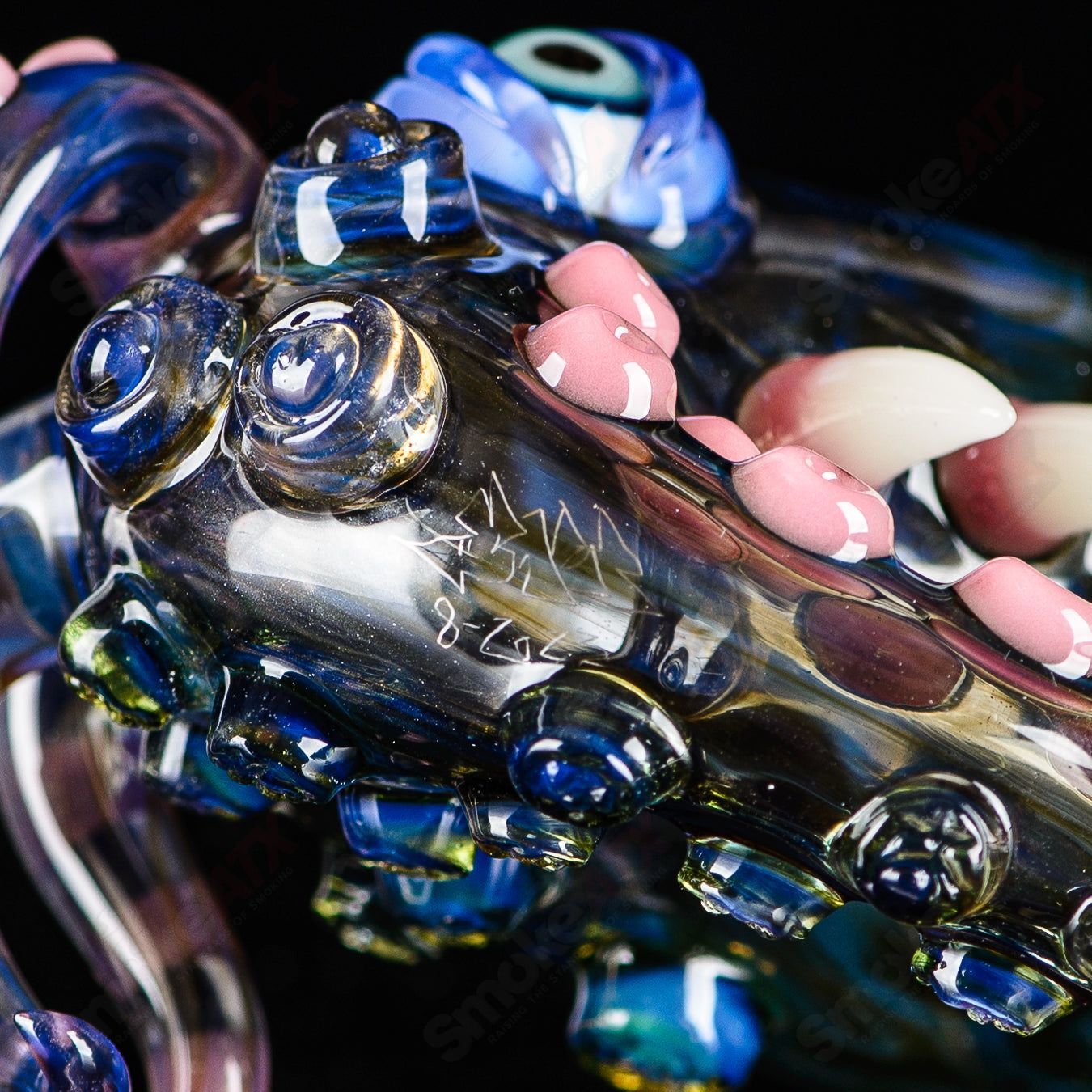 Proxy Sherlock hand pipe by Salt Glass, clear heady glass with intricate Sherlock design and smooth mouthpiece.