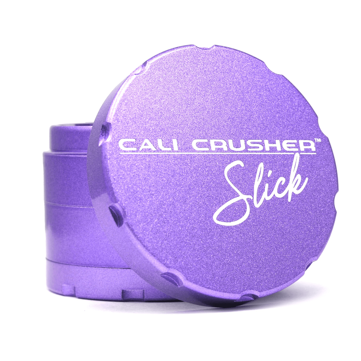 Purple 2.5-inch Cali Crusher 4-piece metal grinder for herbs and tobacco, featuring a sleek design and durable construction.