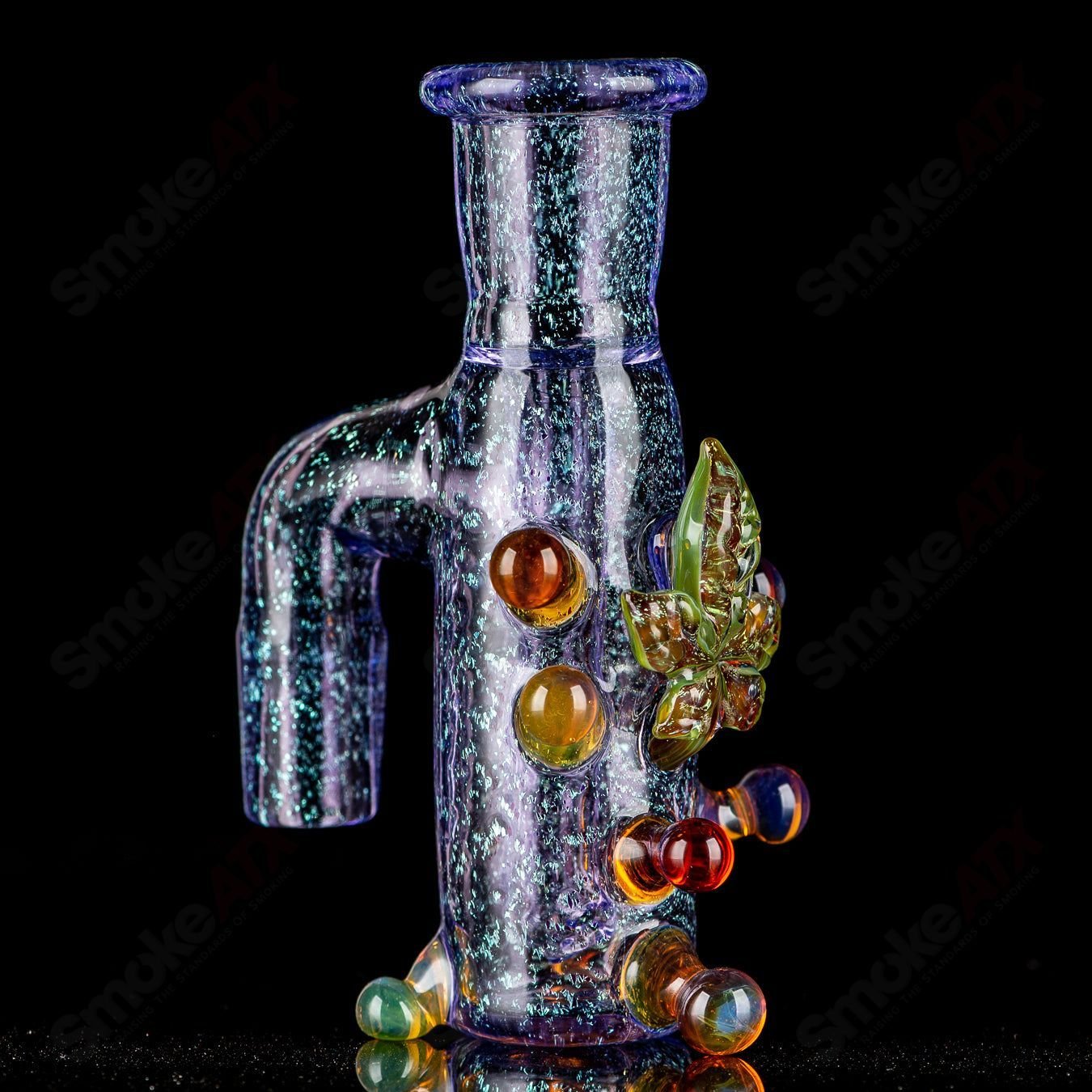 Purple dichro ash catcher with UV leaf design from Mr. Gray, heady glass accessory for enhancing smoking experience.