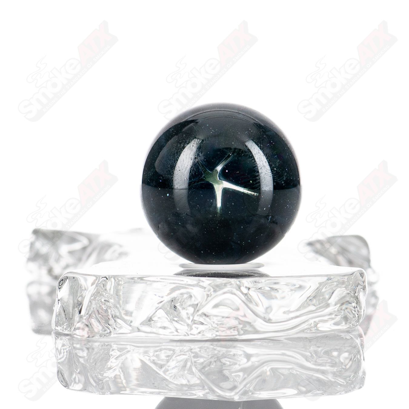 Colorful UV Dotstack MultiEye marble by Indo Glass, featuring vibrant marble glass with eye-catching dot patterns.