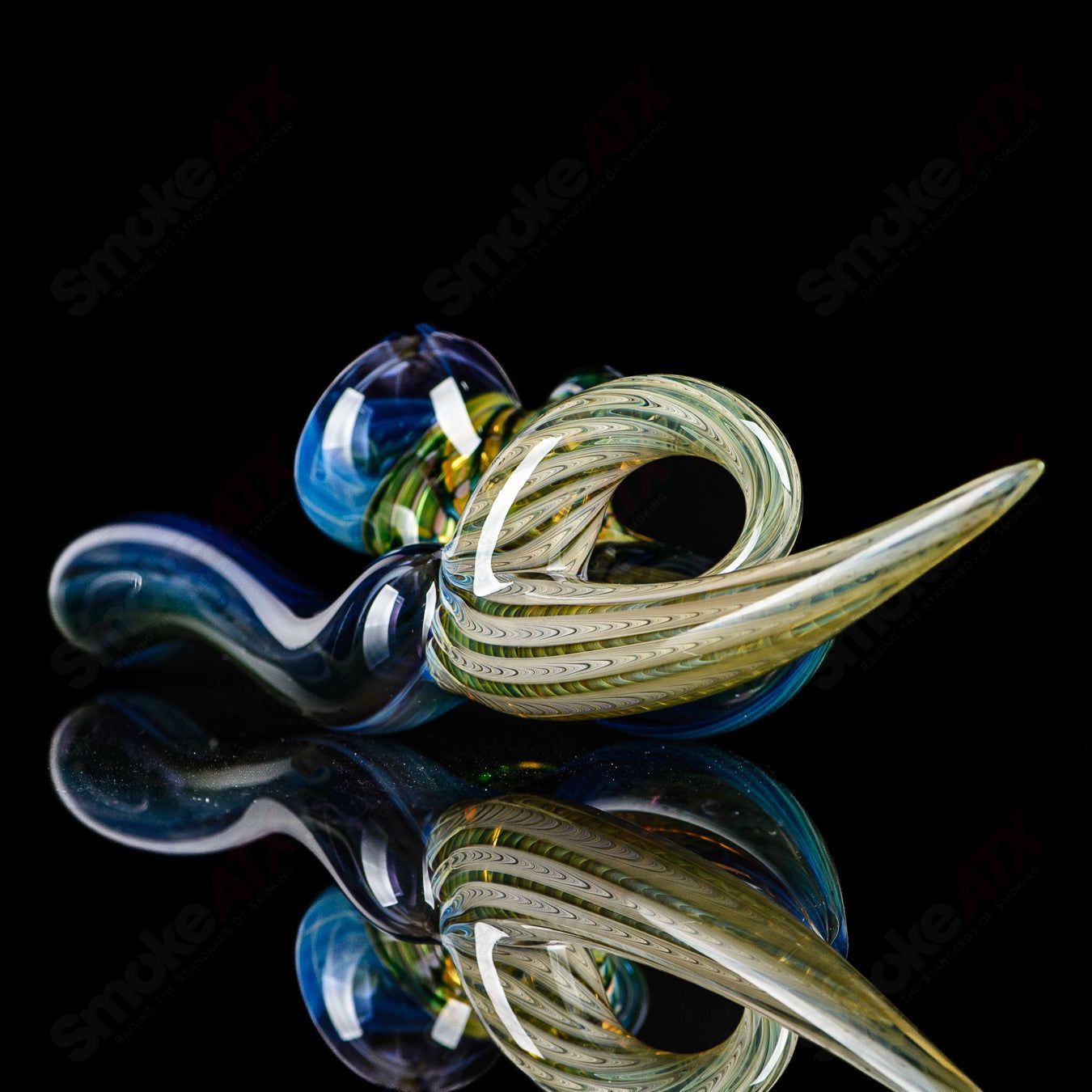 Dosh Glass Raptor Hand Pipe, a colorful heady glass hand pipe with detailed raptor design and smooth glass finish.