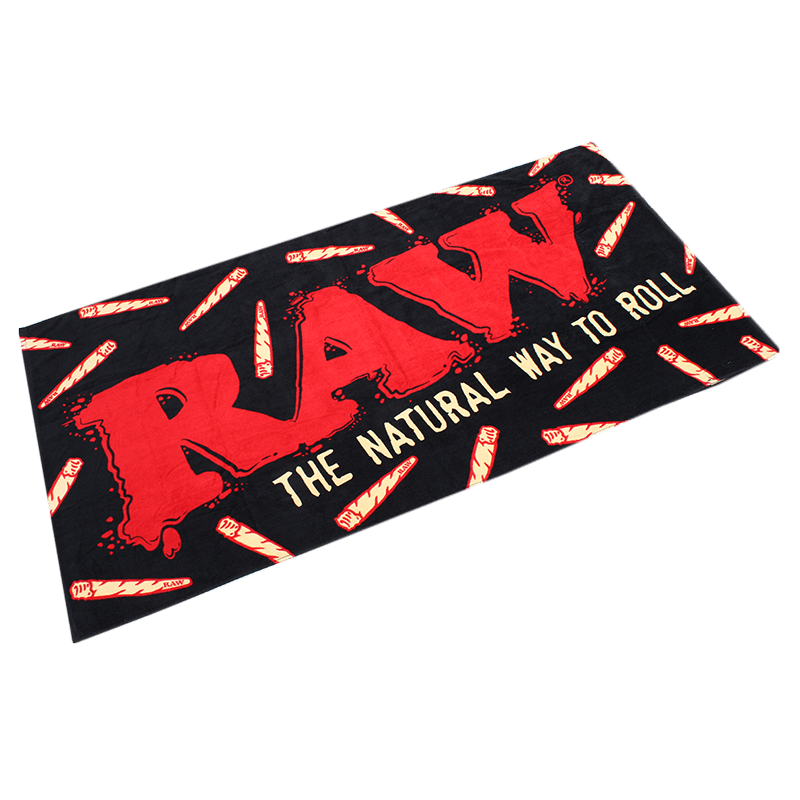RAW Beach Towel with stash pocket, vibrant lifestyle towel featuring bold design and convenient hidden pocket for essentials.