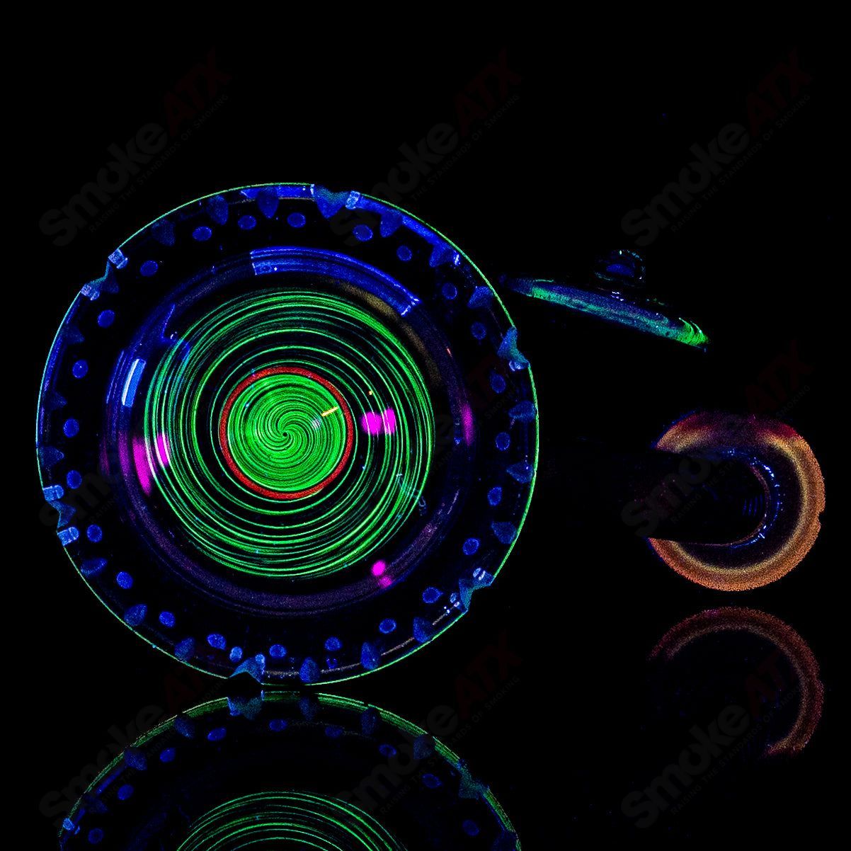 Mobius Recurve Circle Solo #6 of 2024 heady glass bubbler with intricate design and clear glass body.