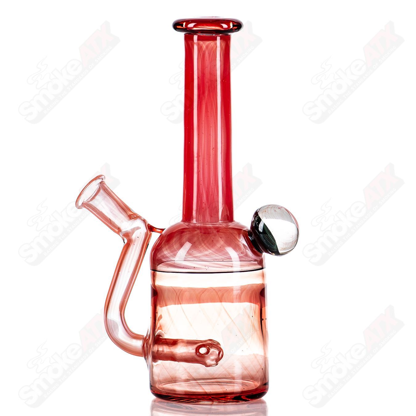 Red Bell Rig by Kate B Glass with fume marble, a colorful glass concentrate rig featuring a red bell shape and intricate marble design.