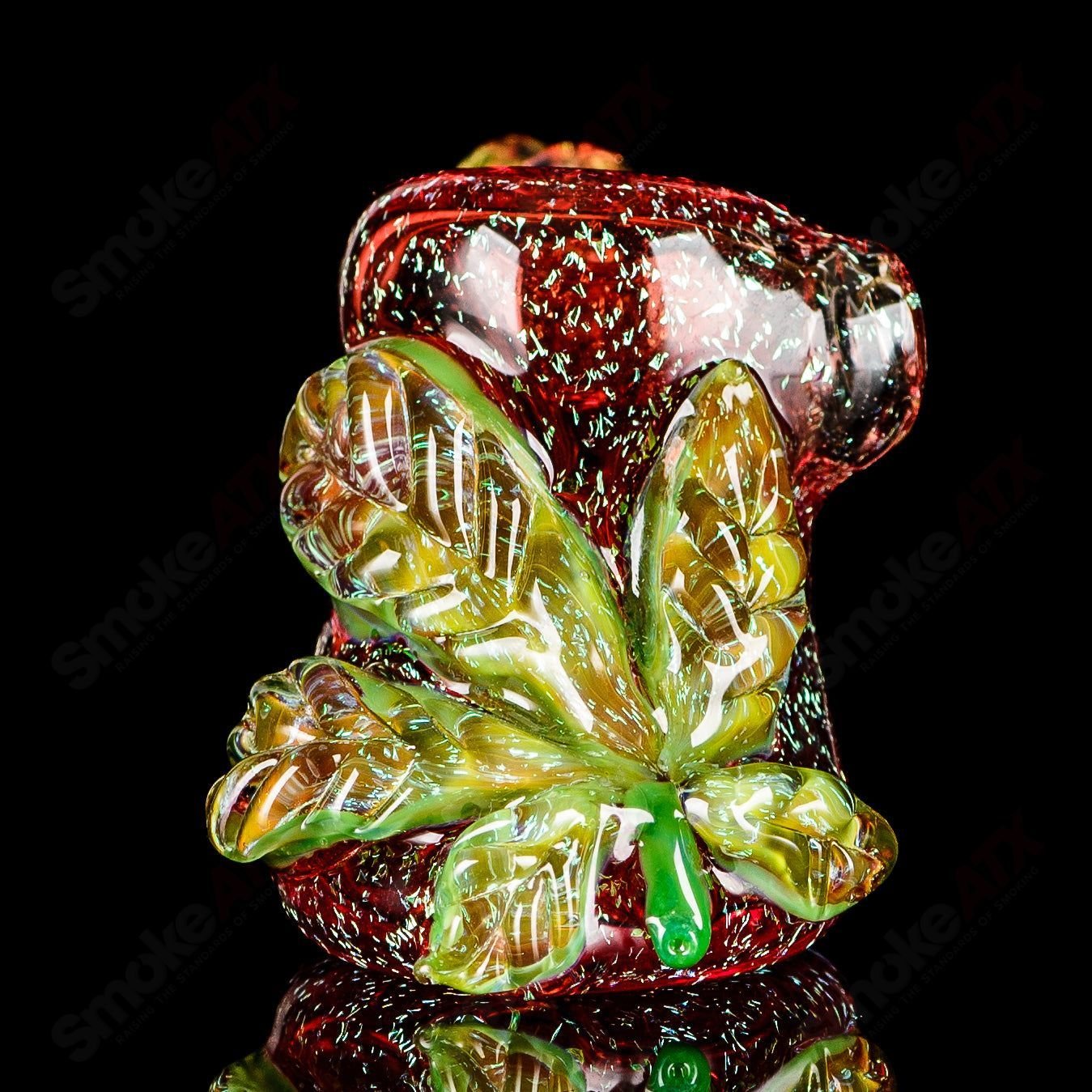 Red Hammer hand pipe by Mr. Gray, a vibrant heady glass piece with a striking red design and ergonomic shape.