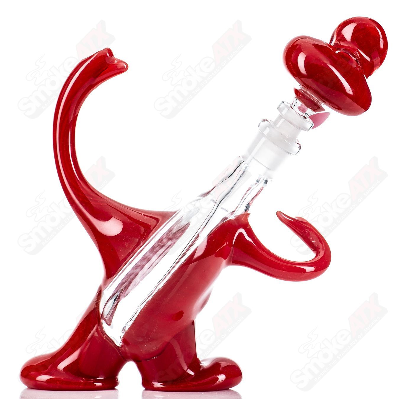 Red Jelly Head Rig by Down Neck Glass, 2011, a colorful head-shaped bubbler with intricate glass details.