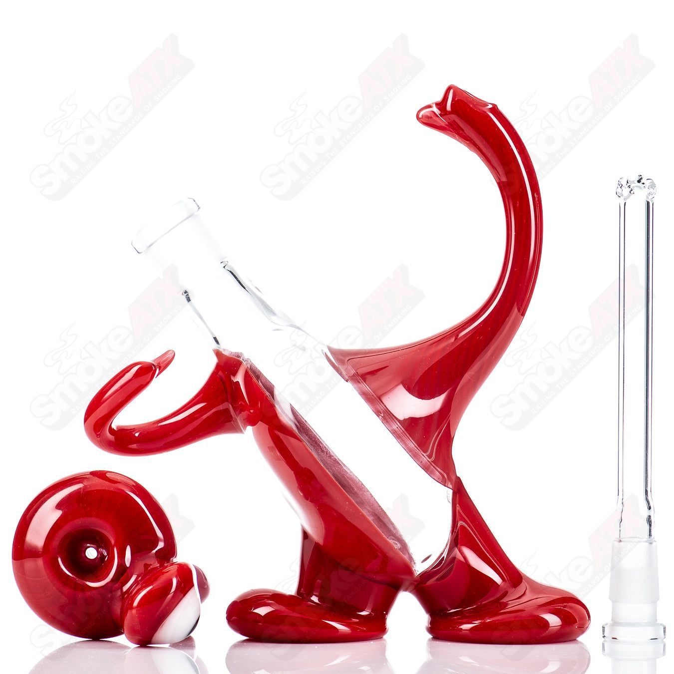 Red Jelly Head Rig by Down Neck Glass, 2011, a colorful head-shaped bubbler made of heady glass, featuring vibrant red accents.
