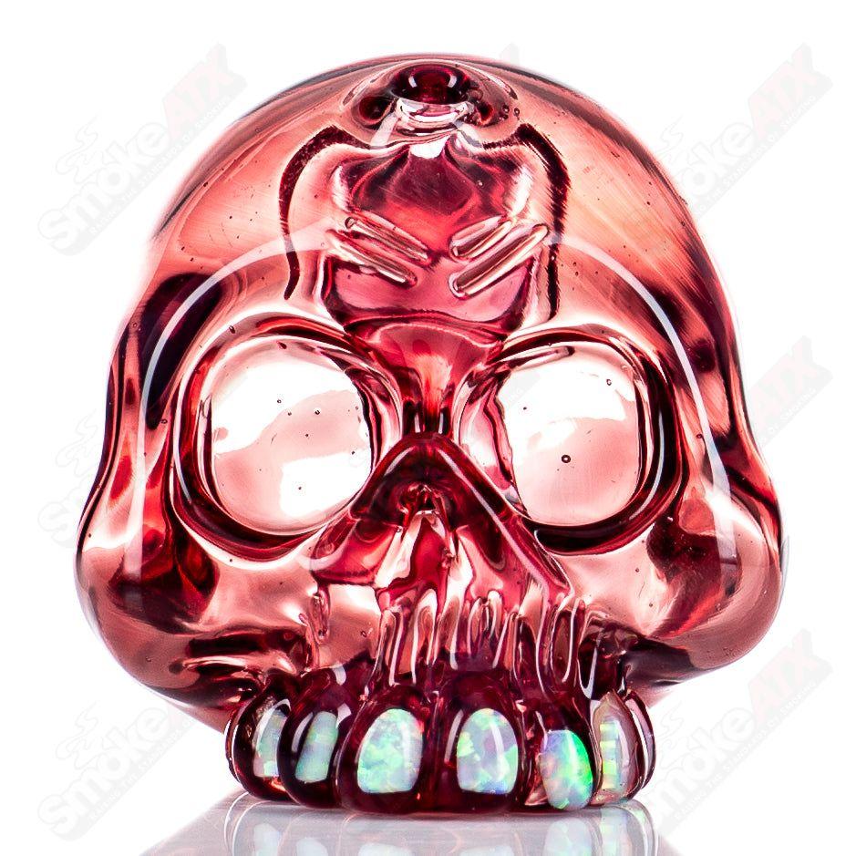 Carsten Carlile Skull Shredder heady glass concentrate rig with a detailed skull design, featuring clear and colored glass accents.