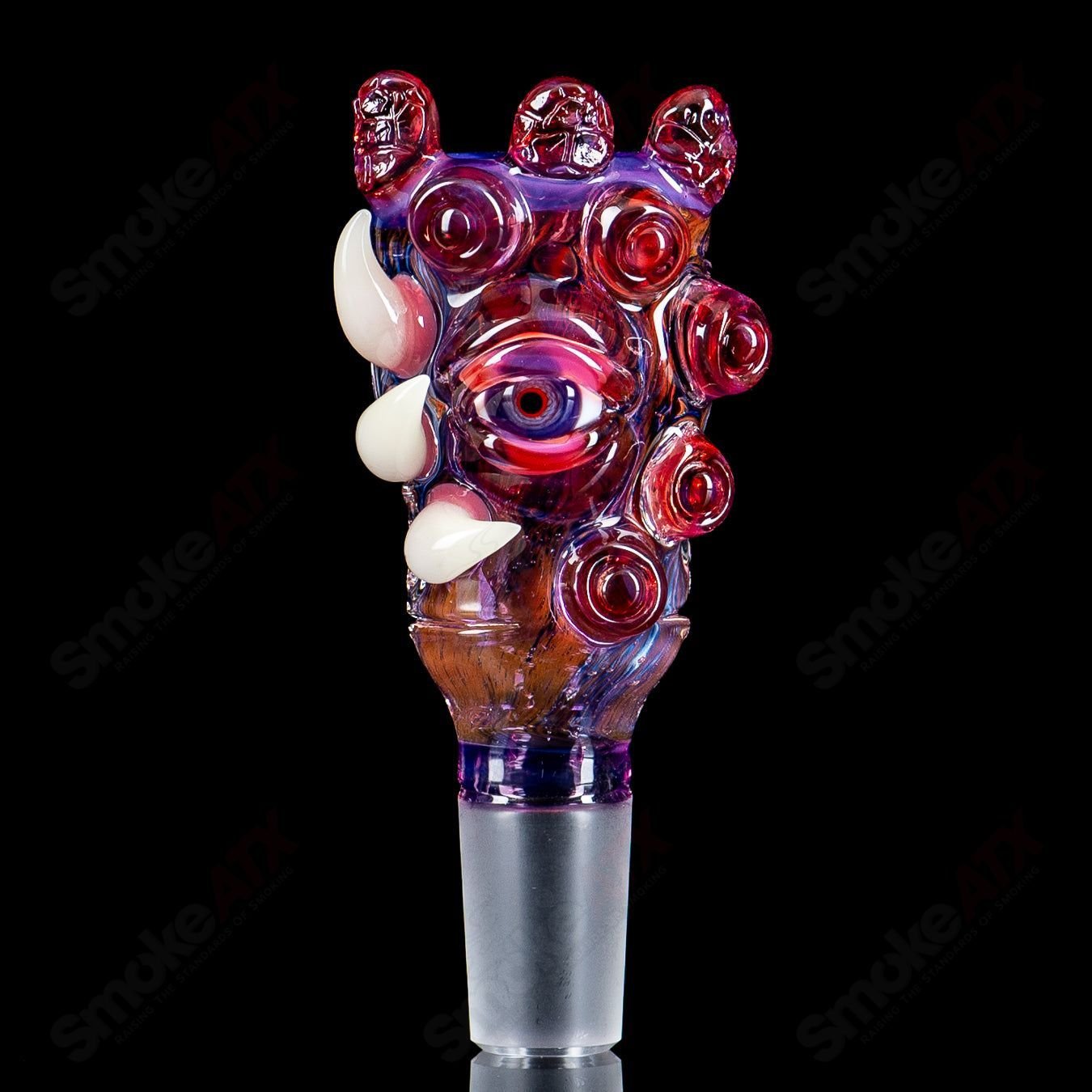 Colorful Heady Glass slide bowl by Nobody Glass x SALT, featuring intricate design and clear glass craftsmanship.