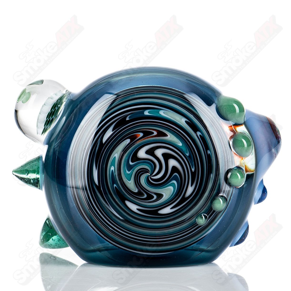 JMass Heady Glass spiked spoon hand pipe with honeycomb design, featuring intricate honeycomb patterns and a spiked detail.