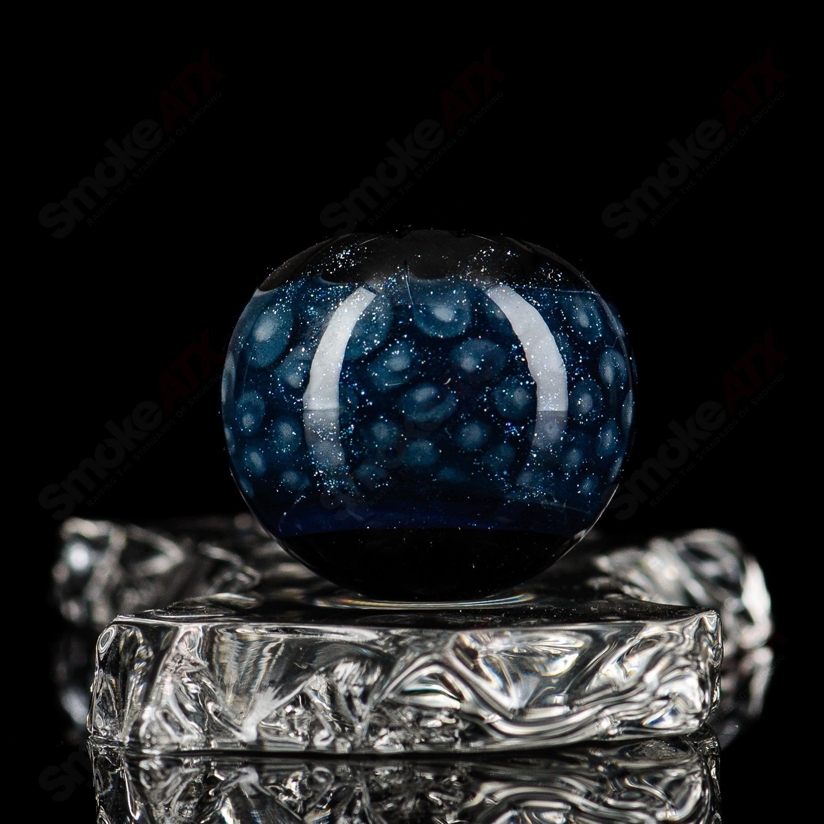 Colorful marble glass marbles from Flex Glass, showcasing smooth, shiny marble-shaped glass pieces in various colors.